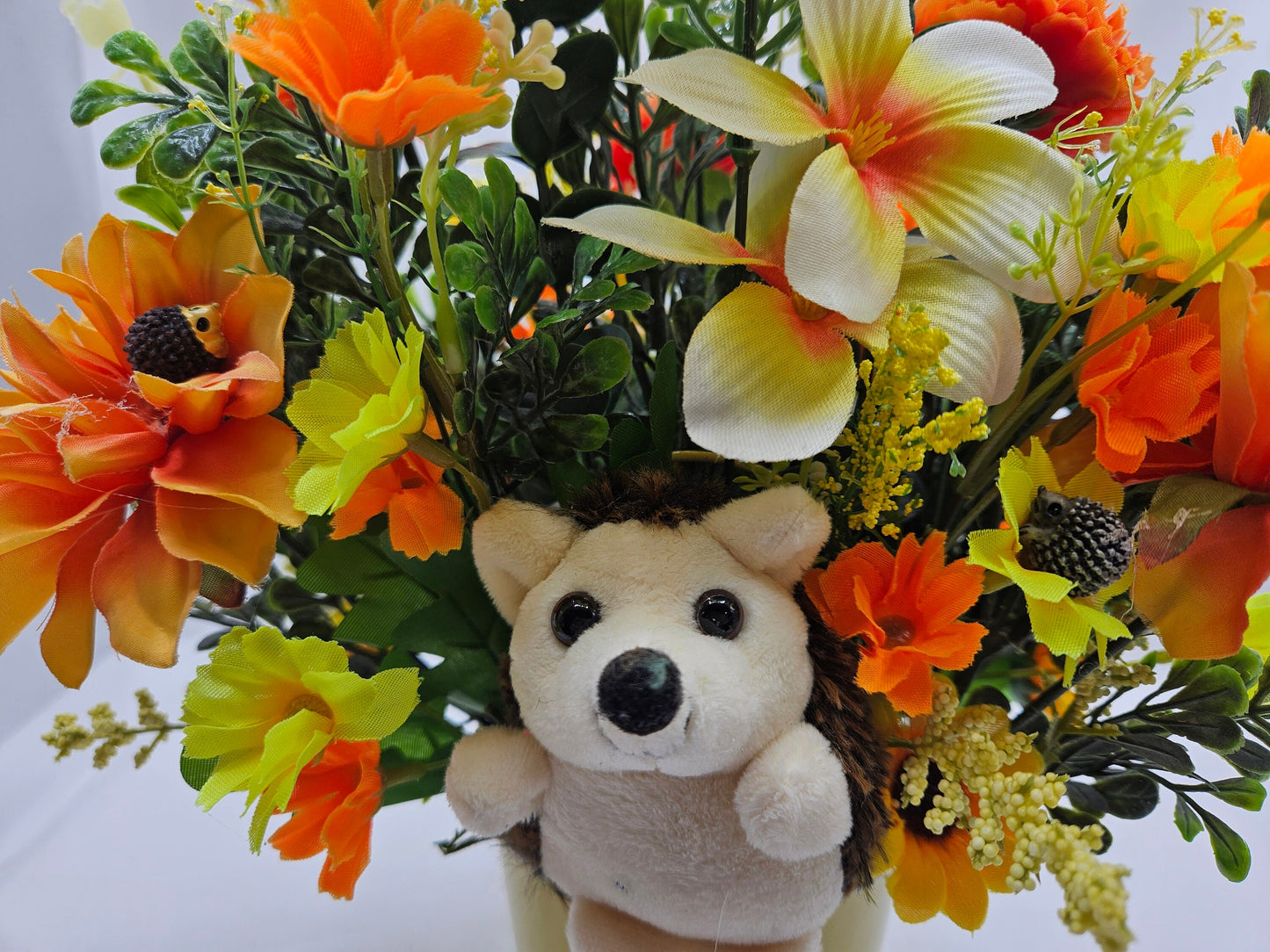 Cute Hedgehogs in a Bright, Vivid Cheerful Yellow floral Garden, A Plush Hedgehog Plus Smaller ones Scattered Throughout the Floral Piece