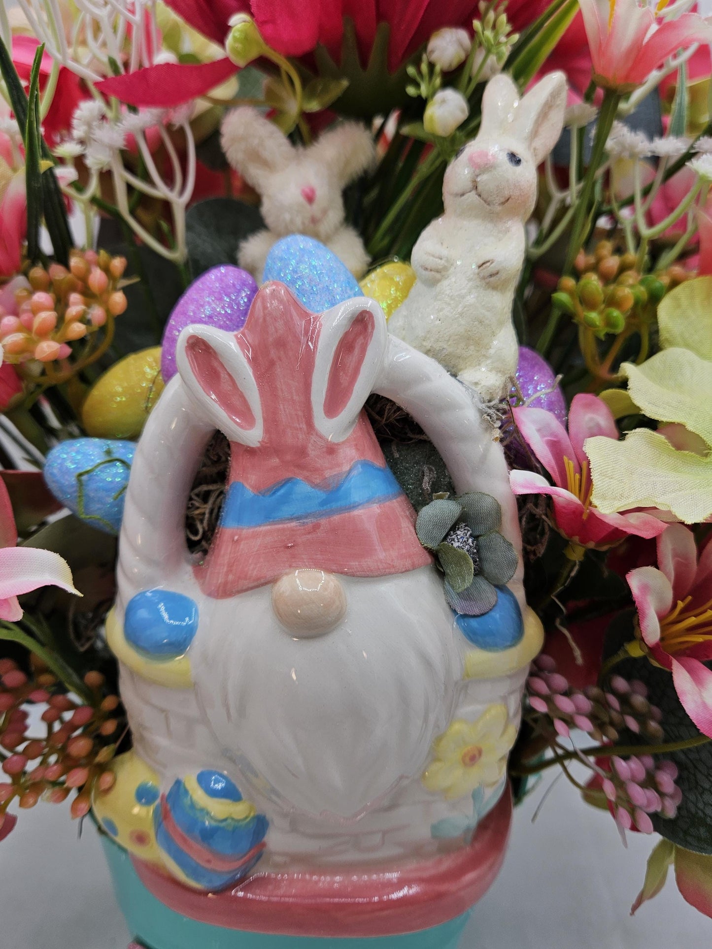 Bunny Gnome in Ceramic Basket within Floral Arrangment of Pink/Green Hydragena, Babys Breath, Easter Eggs, Holiday Accents/Blue Plastic Pail