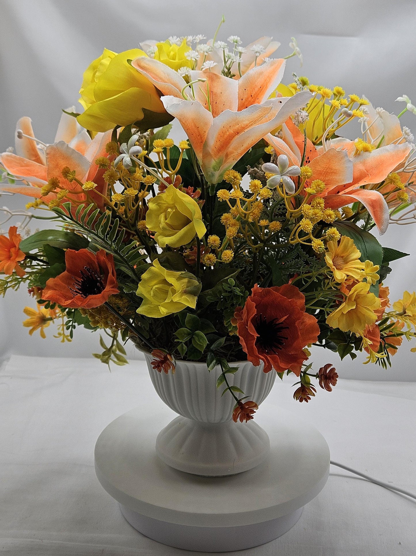 Momma and baby deer frolicking in a floral garden of yellow and orange Lilies, Pansies, Roses/other Florals, Greenery/Baby's Breath/Gifting