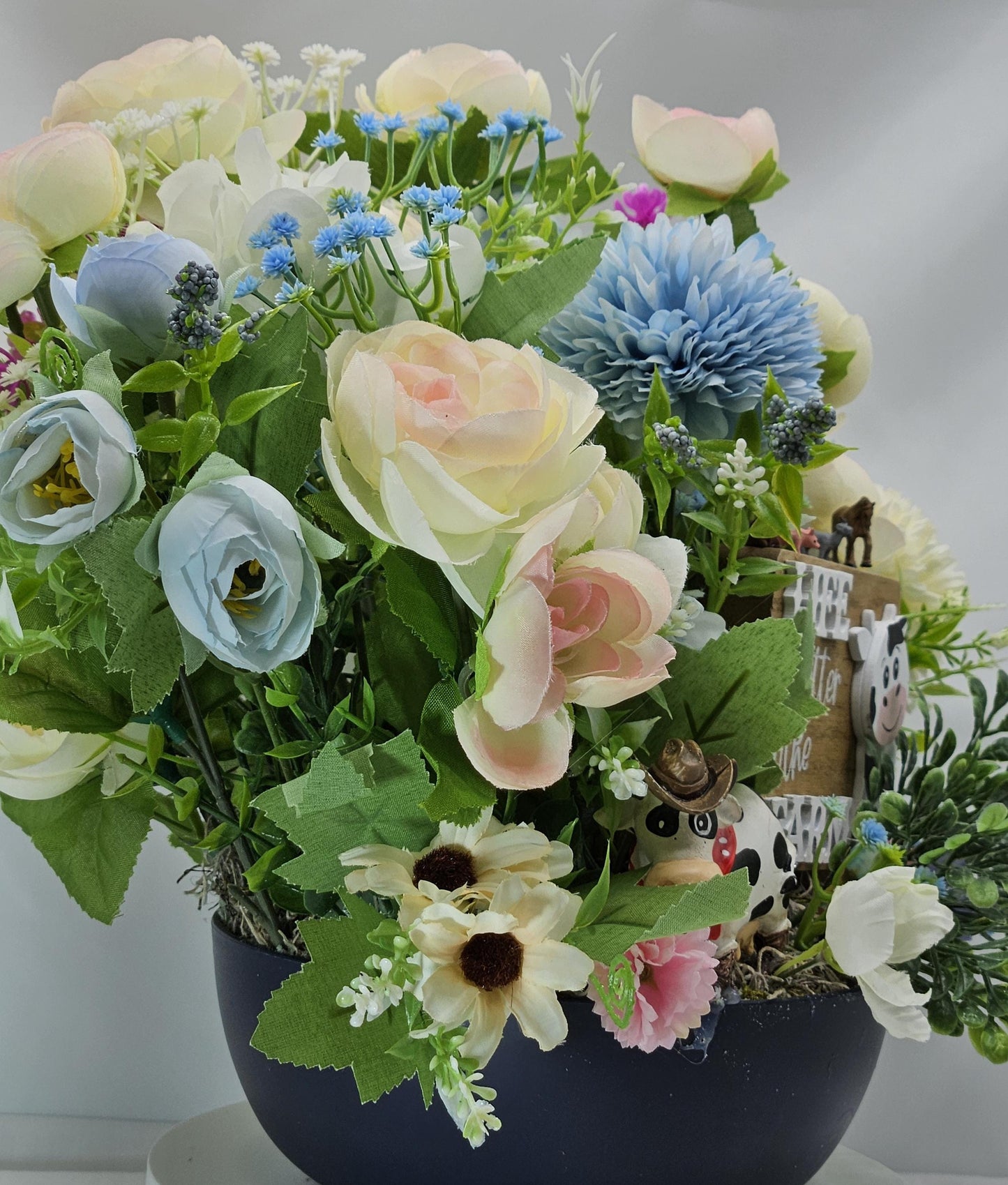 Life is Better on the Farm Floral Centerpiece w/Country Cow, Curious Sign and Various Farm Farm Animals Amidst Ranunculus/Other Flowers