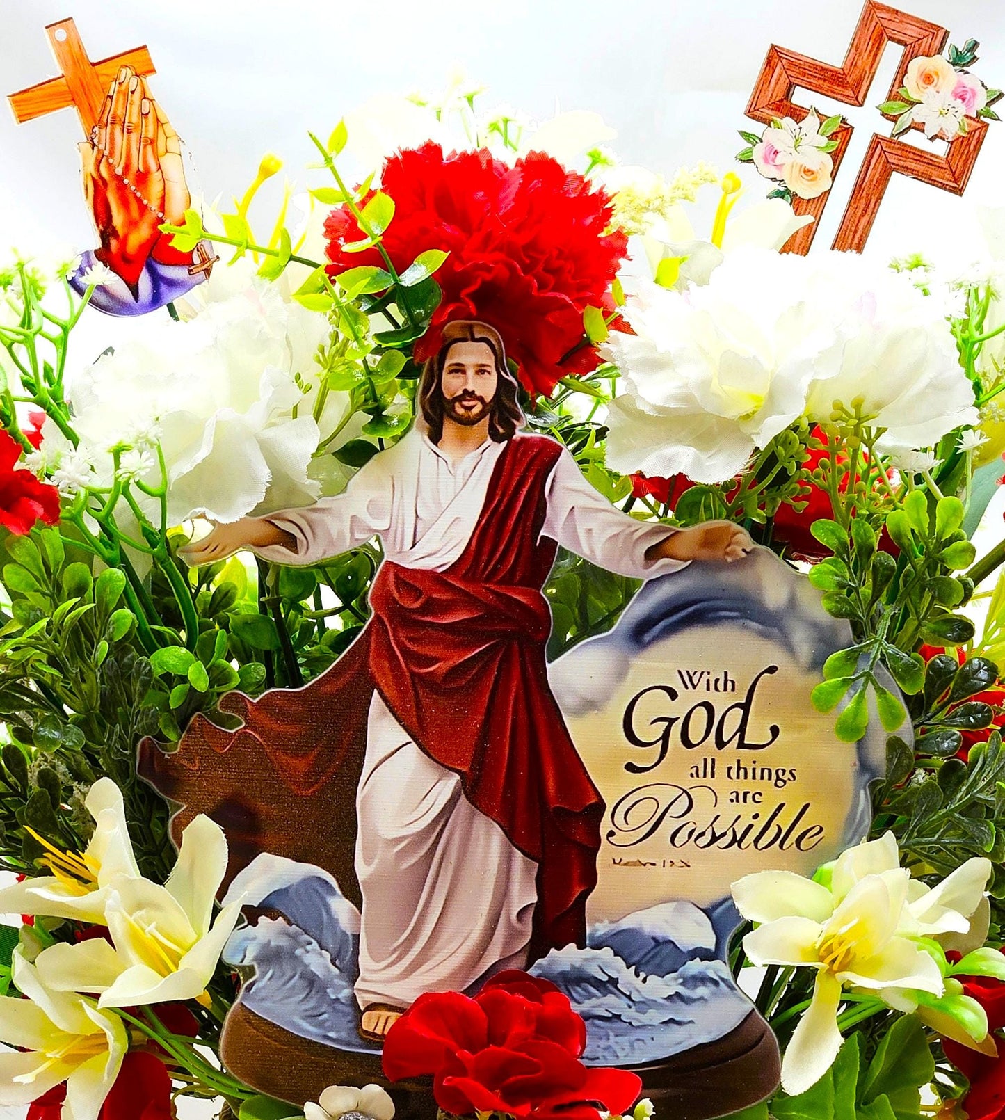 With God All Things Are Possible Flower Centerpiece Featuring Jesus Rising Within A Floral Garden of Lilies/Carnations/Added Cross Signs