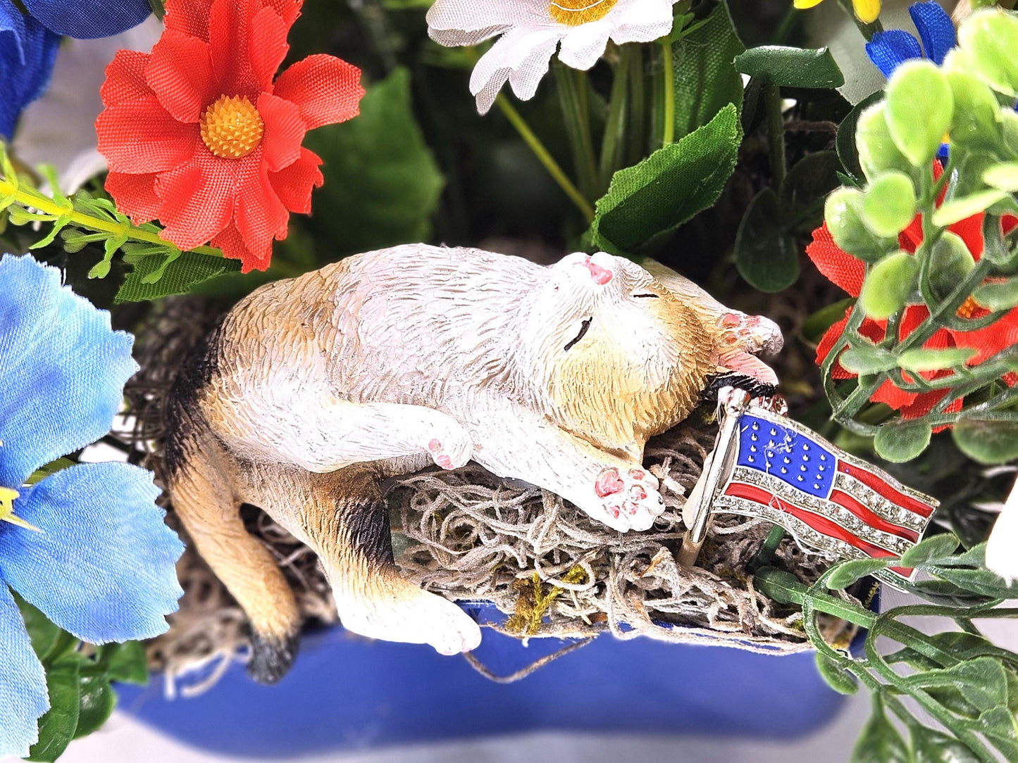 Patriotic Cat Floral Arrangement – Belly-Up Kitten or Lying Cat in Star Dish with Red White Blue Flowers
