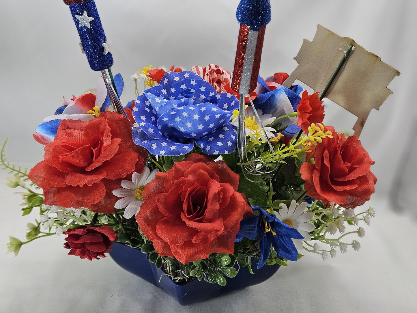 Patriotic Cat Floral Arrangement – Belly-Up Kitten or Lying Cat in Star Dish with Red White Blue Flowers