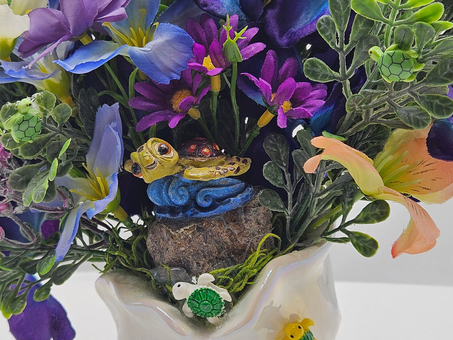 Cute Turtles Amidst a Purple and Yellow Floral Centerpiece Set in a Ceramic White Seashell, Great Gift for the Beach and Tropical Lover