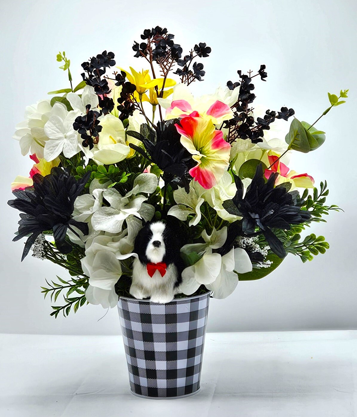 Unique Dog Enriched Black and White Floral Decor with Touch of Pink and Yellow in Black and White Checkered Pot