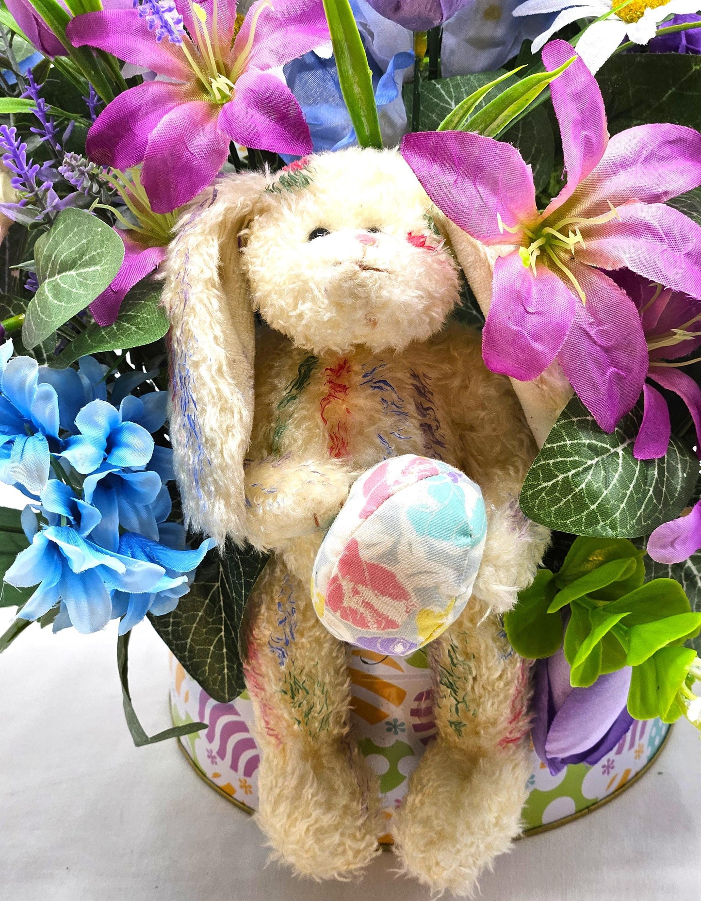 Large Easter Egg Tin with Vintage Rabbit Holding an Egg and Sitting amidst Purple/Lilac Lilies/Tulips and Blue Hyacinths