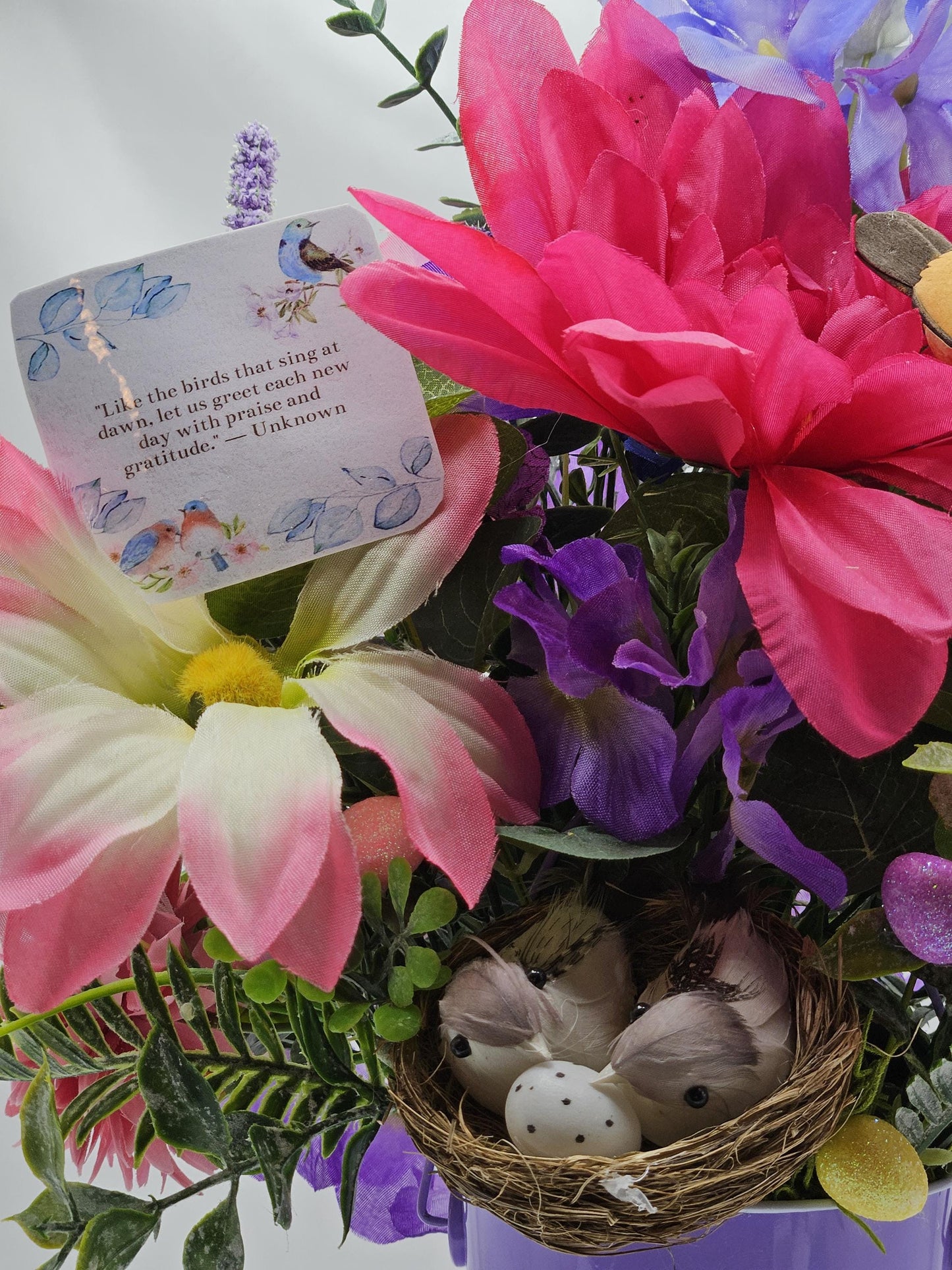 Charming Thinking Of You Bouquet set in a light purple container and accented with birds in a nest and/Atop Flowers/Pink/White/Blue/Greenery