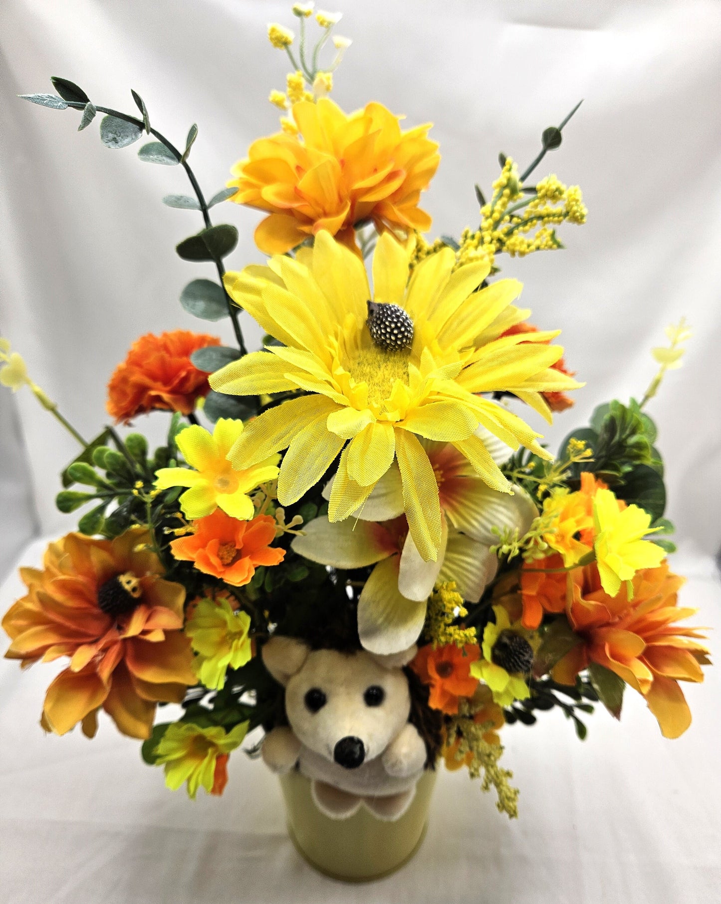 Cute Hedgehogs in a Bright, Vivid Cheerful Yellow floral Garden, A Plush Hedgehog Plus Smaller ones Scattered Throughout the Floral Piece