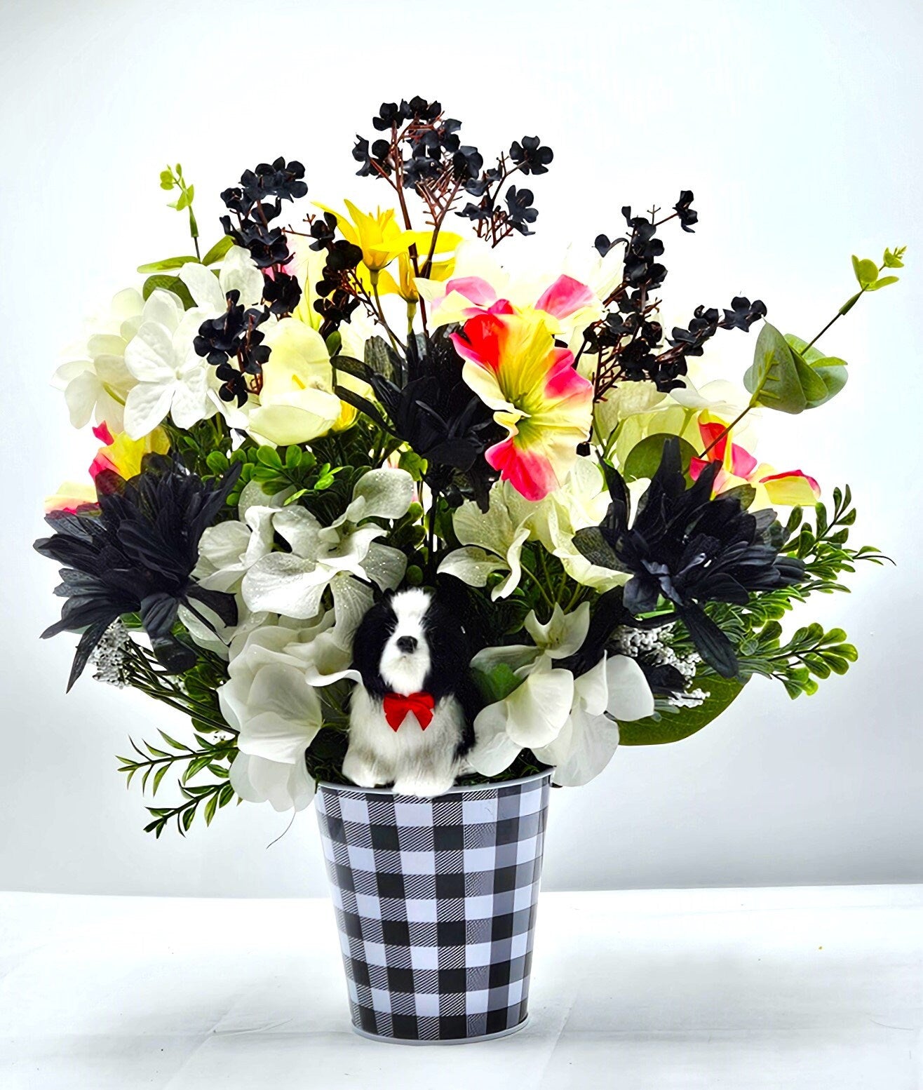 Unique Dog Enriched Black and White Floral Decor with Touch of Pink and Yellow in Black and White Checkered Pot
