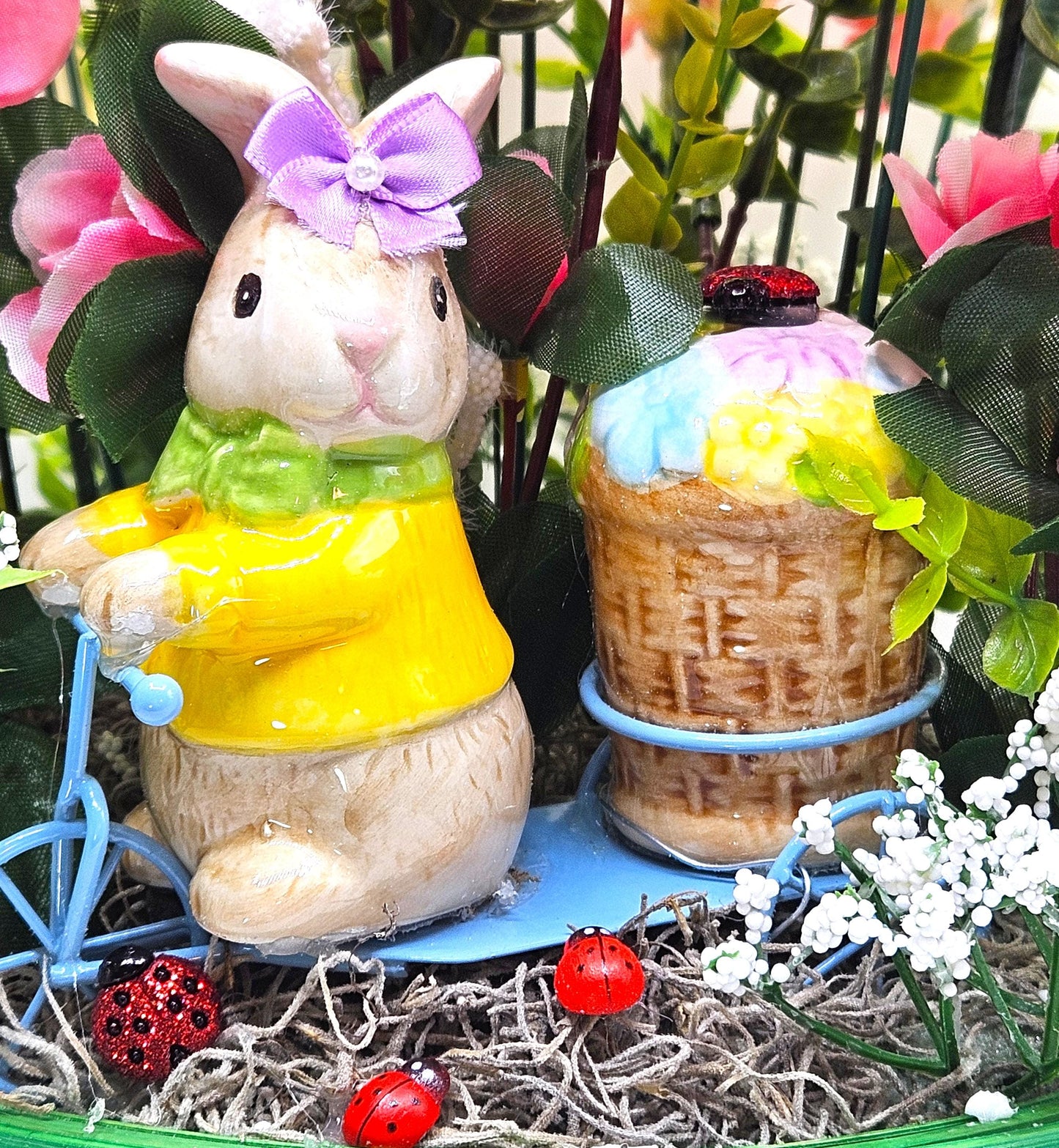 Whimsical Easter Basket/Rabbit in Bike Carrying Goodies/Accented W/cute Ladybugs/Hot Pink Lilies/Other florals/pink/green/Greens/Baby Breath