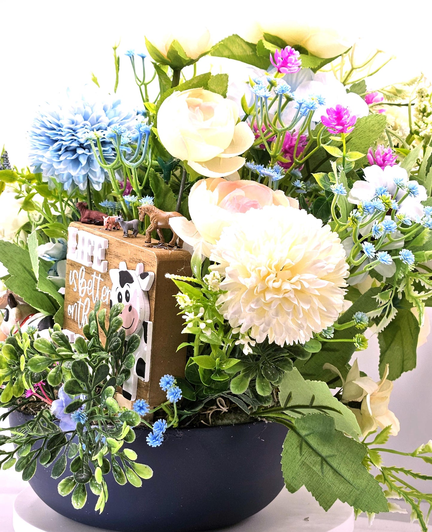Life is Better on the Farm Floral Centerpiece w/Country Cow, Curious Sign and Various Farm Farm Animals Amidst Ranunculus/Other Flowers