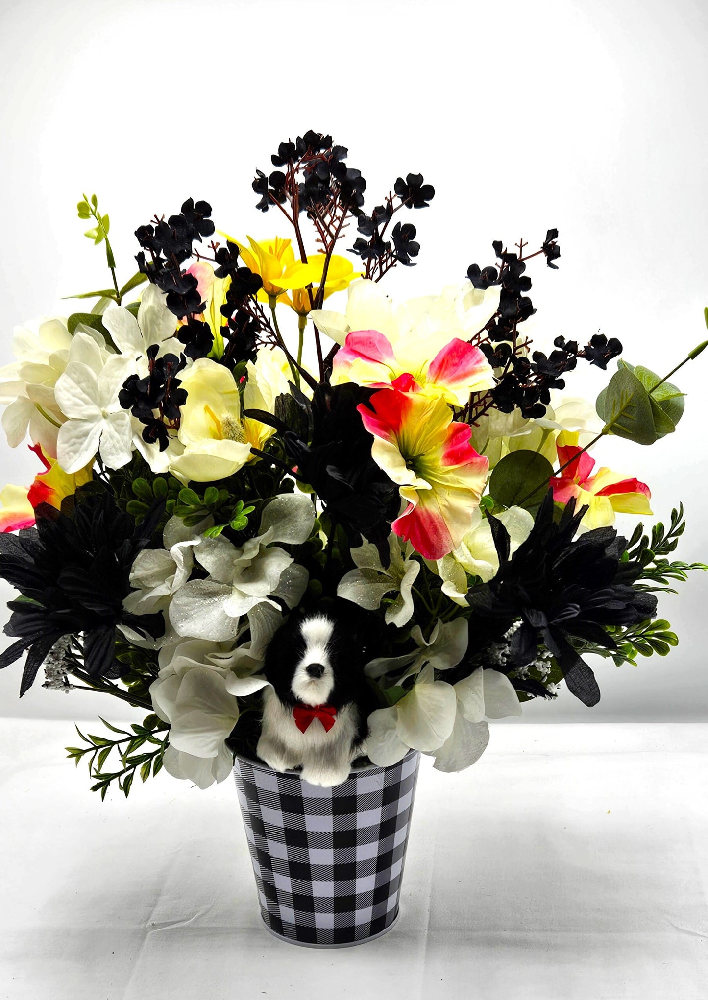Unique Dog Enriched Black and White Floral Decor with Touch of Pink and Yellow in Black and White Checkered Pot