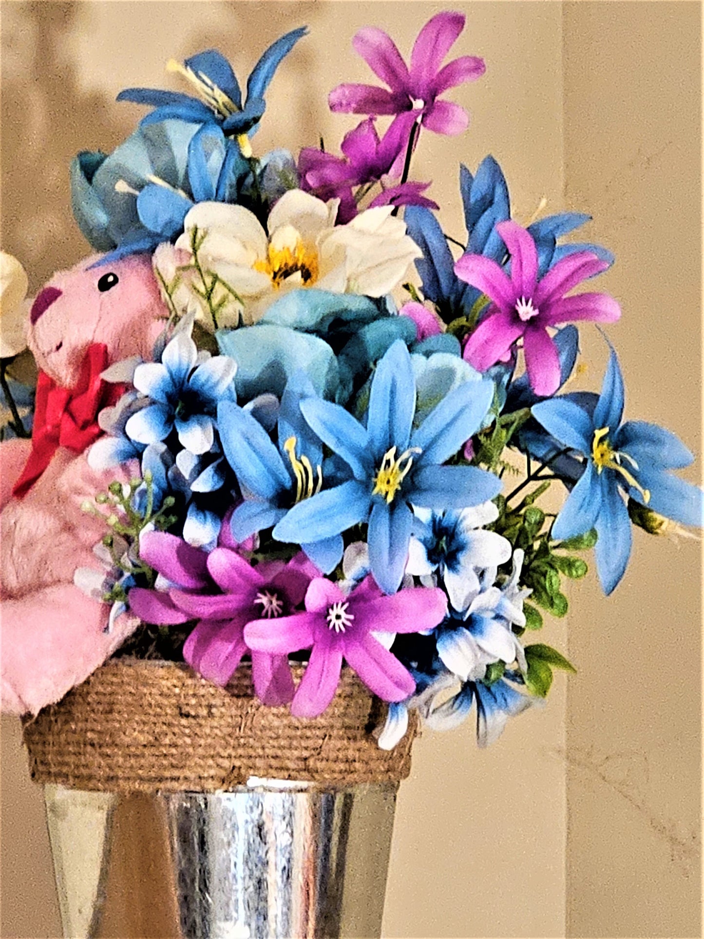 Artificial Flower Arrangement with Teddy Bear Sitting in a Bucket