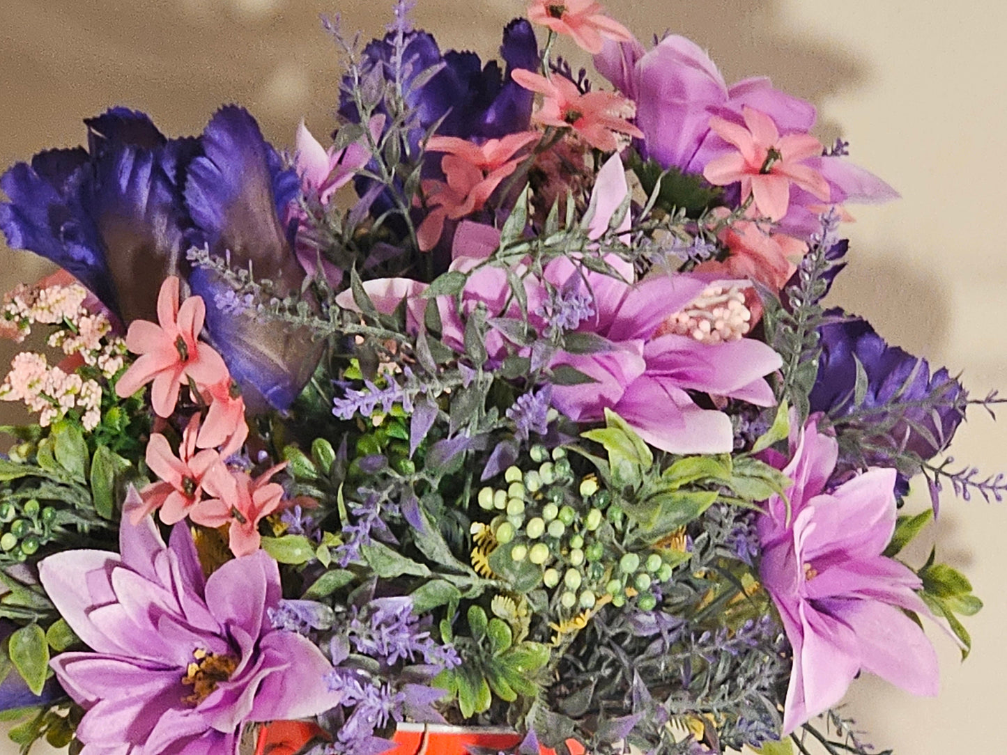 Artificial Floral Arrangement in Round Red Bucket with Gnome
