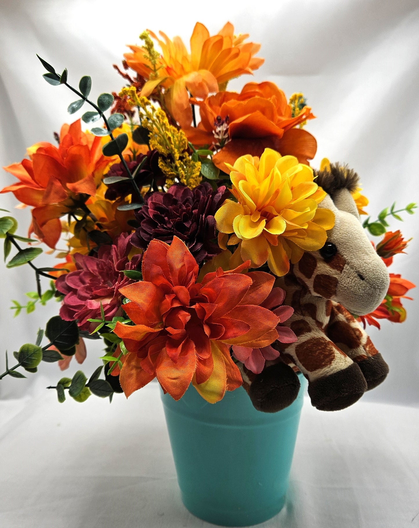 Artificial Flower Arrangement with Whimsical Little Giraffe Set in Aqua Blue Plastic Pail/Earthtone Floral Garden