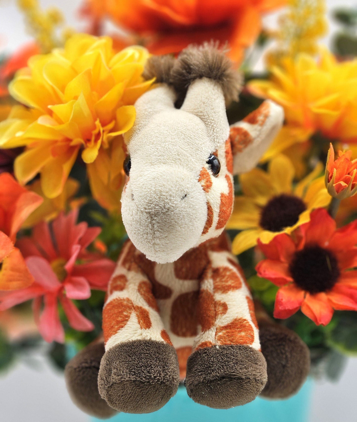 Artificial Flower Arrangement with Whimsical Little Giraffe Set in Aqua Blue Plastic Pail/Earthtone Floral Garden