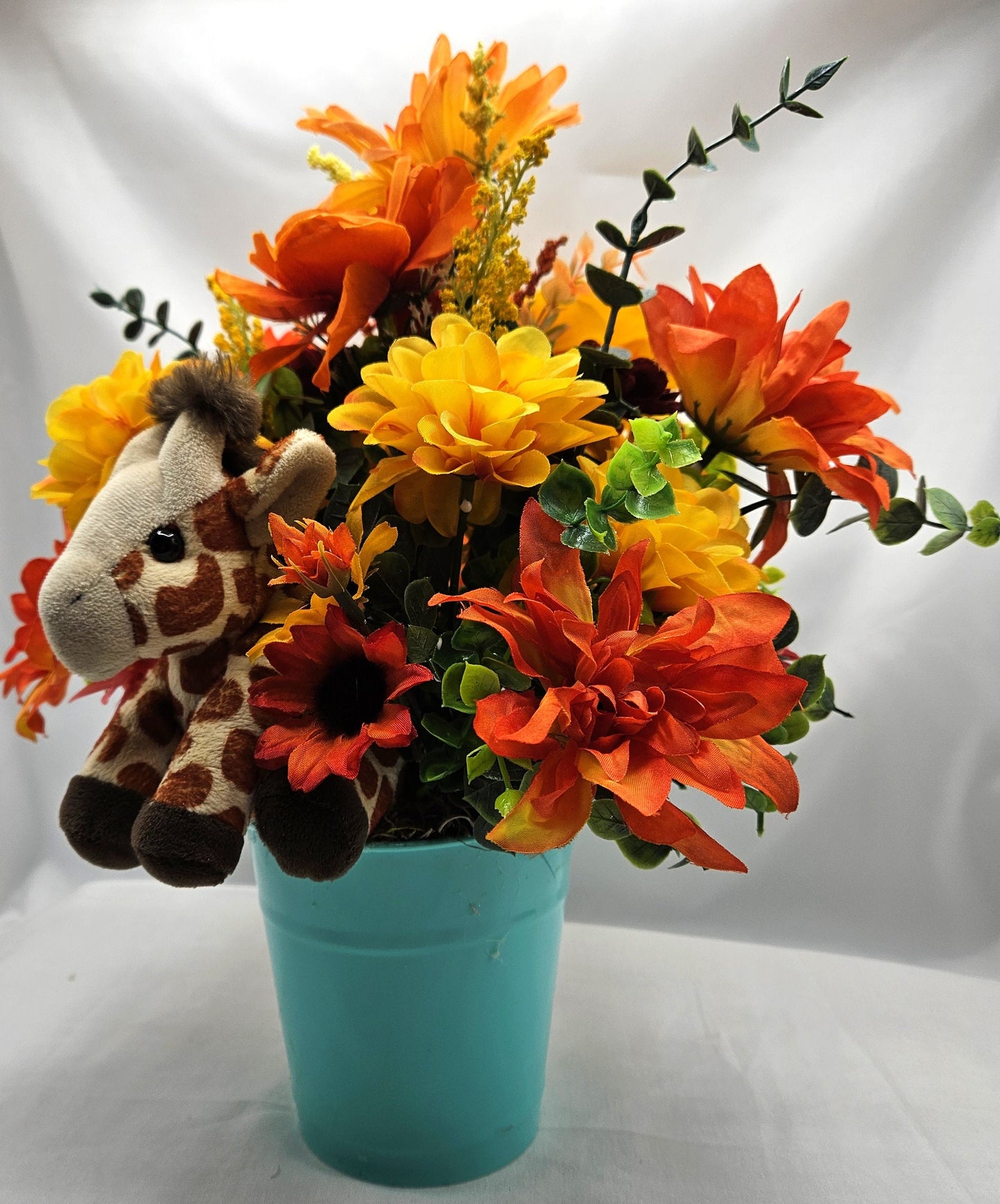 Artificial Flower Arrangement with Whimsical Little Giraffe Set in Aqua Blue Plastic Pail/Earthtone Floral Garden