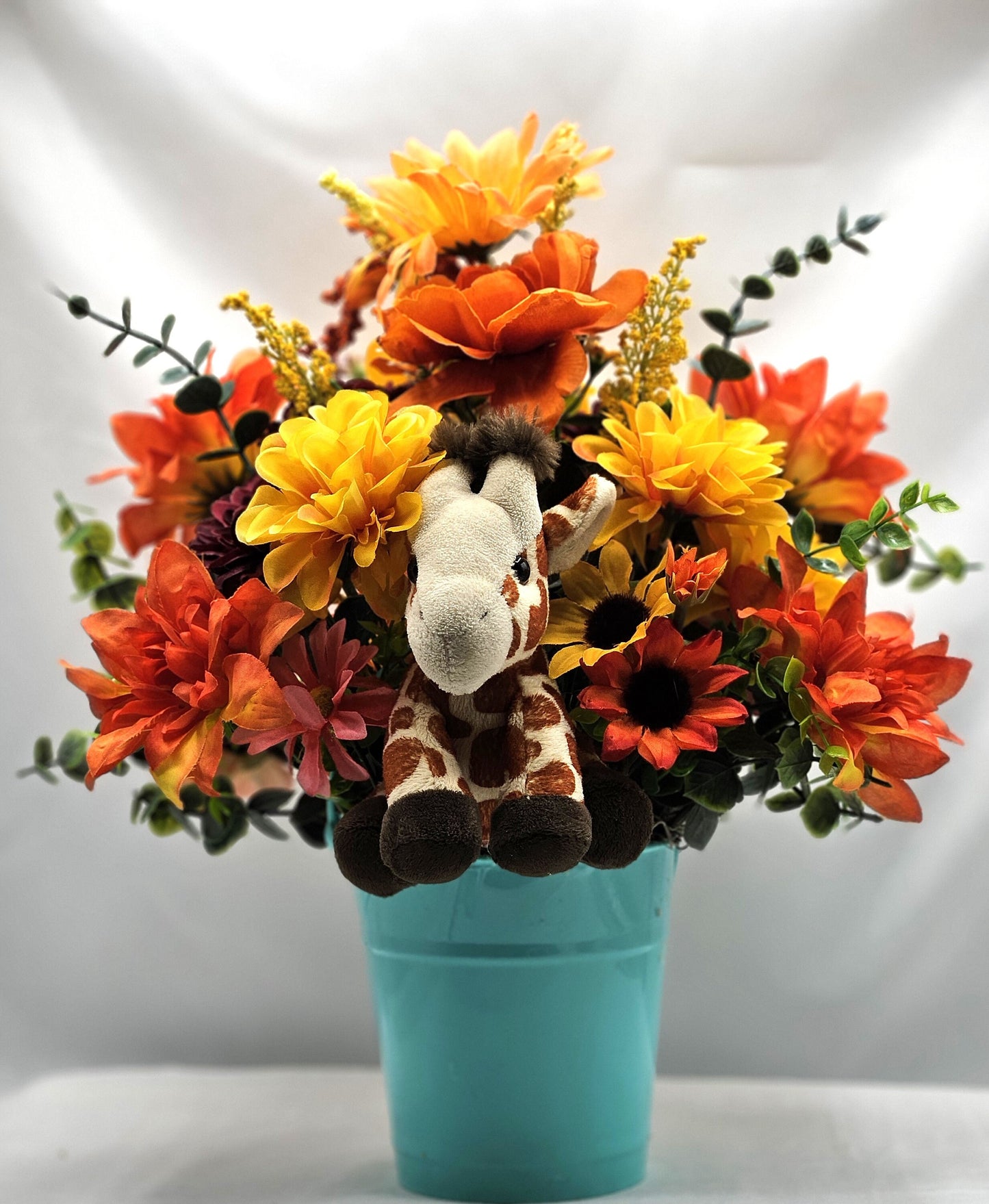 Artificial Flower Arrangement with Whimsical Little Giraffe Set in Aqua Blue Plastic Pail/Earthtone Floral Garden