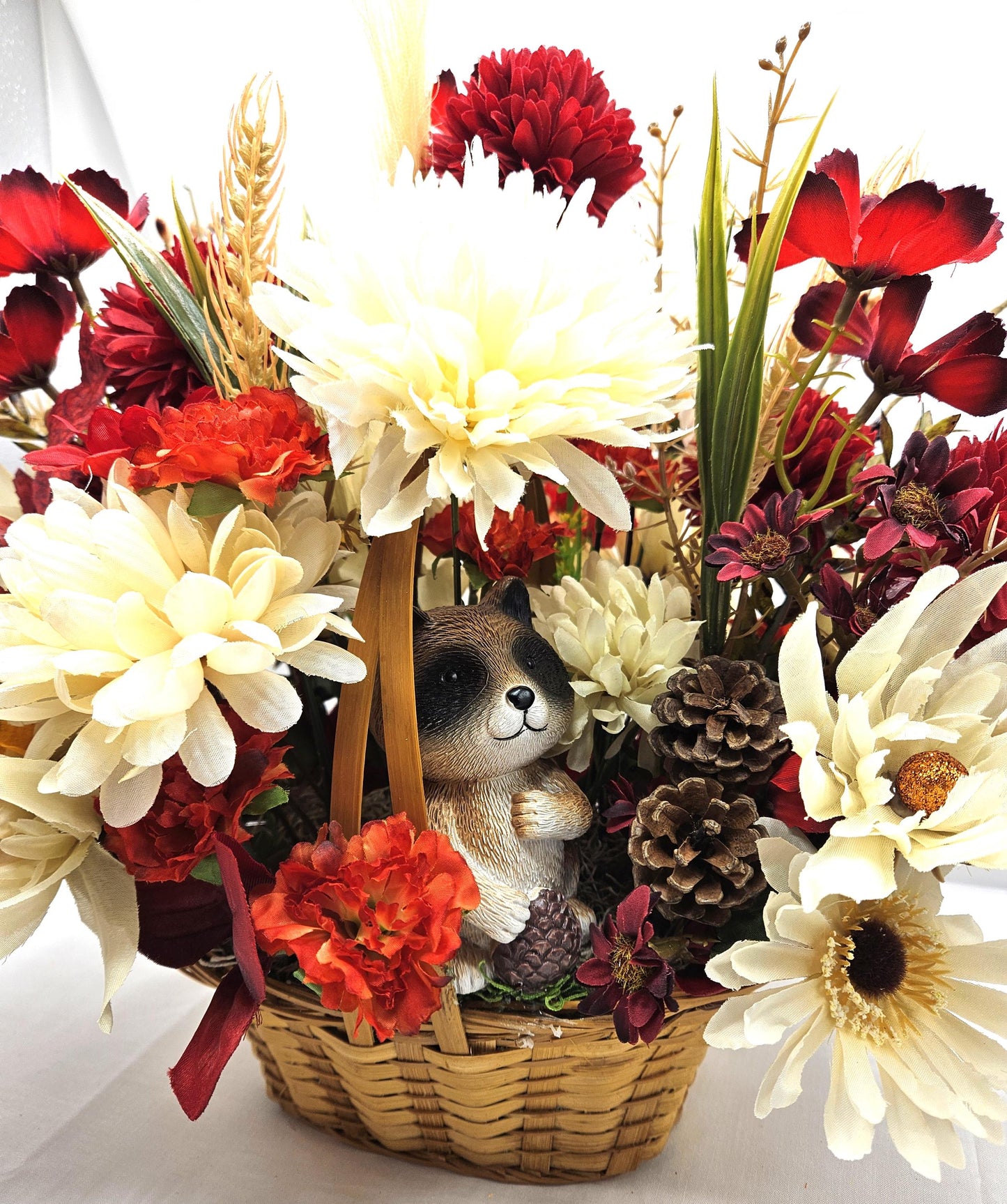 Deep Red and White Mums, Daisies, Other Wildflowers/Fall Leaves/Woodland Raccoon, Set in Handle Wicker Basket, Fall/Autumn Accents