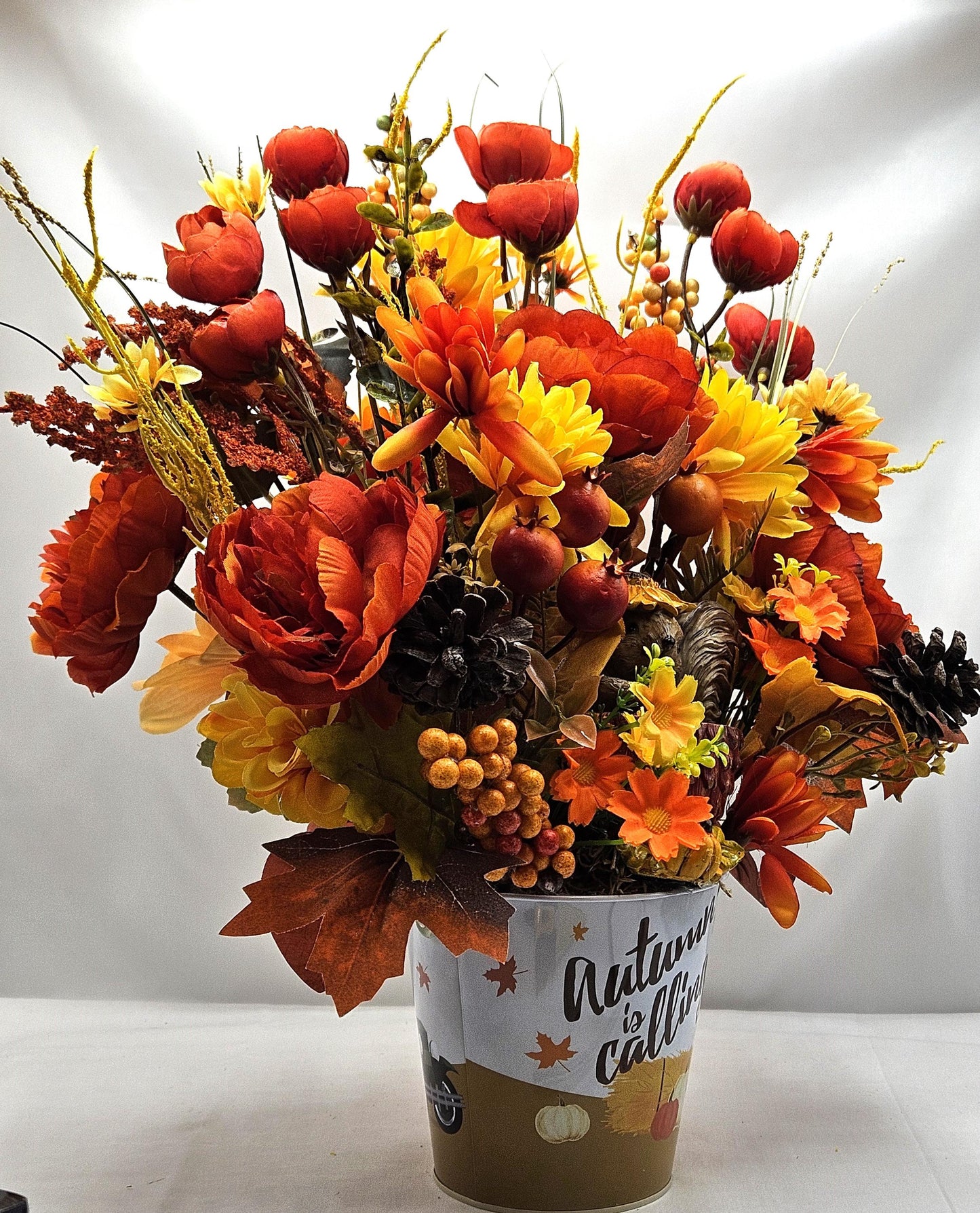 Autumn Is Calling Flower Arrangement/Cute Ceramic Squirrel Amidst Burnt Orange/Yellow Fall Flowers/Pine Cones/Berries/Wheat/Fall Grasses