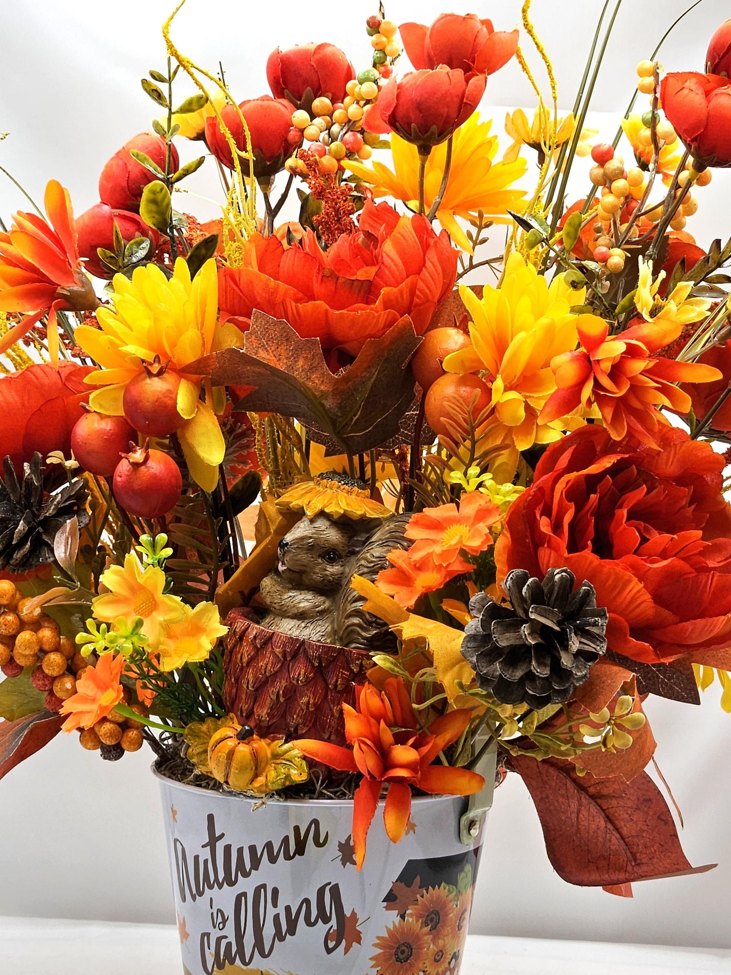 Autumn Is Calling Flower Arrangement/Cute Ceramic Squirrel Amidst Burnt Orange/Yellow Fall Flowers/Pine Cones/Berries/Wheat/Fall Grasses