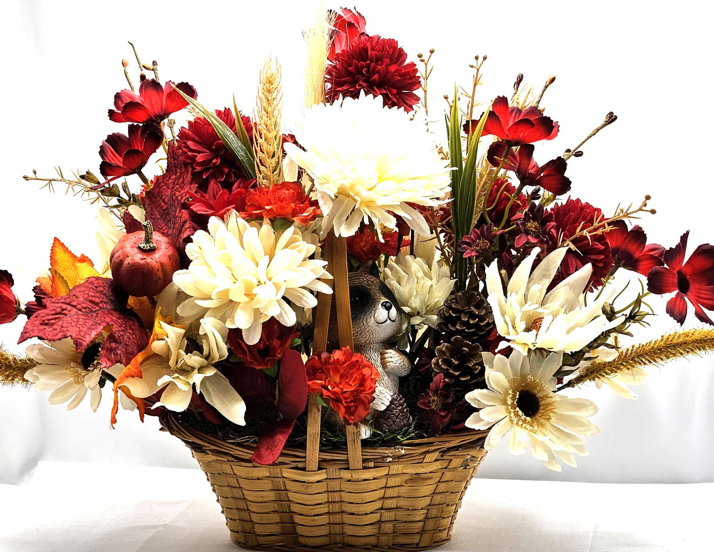 Deep Red and White Mums, Daisies, Other Wildflowers/Fall Leaves/Woodland Raccoon, Set in Handle Wicker Basket, Fall/Autumn Accents