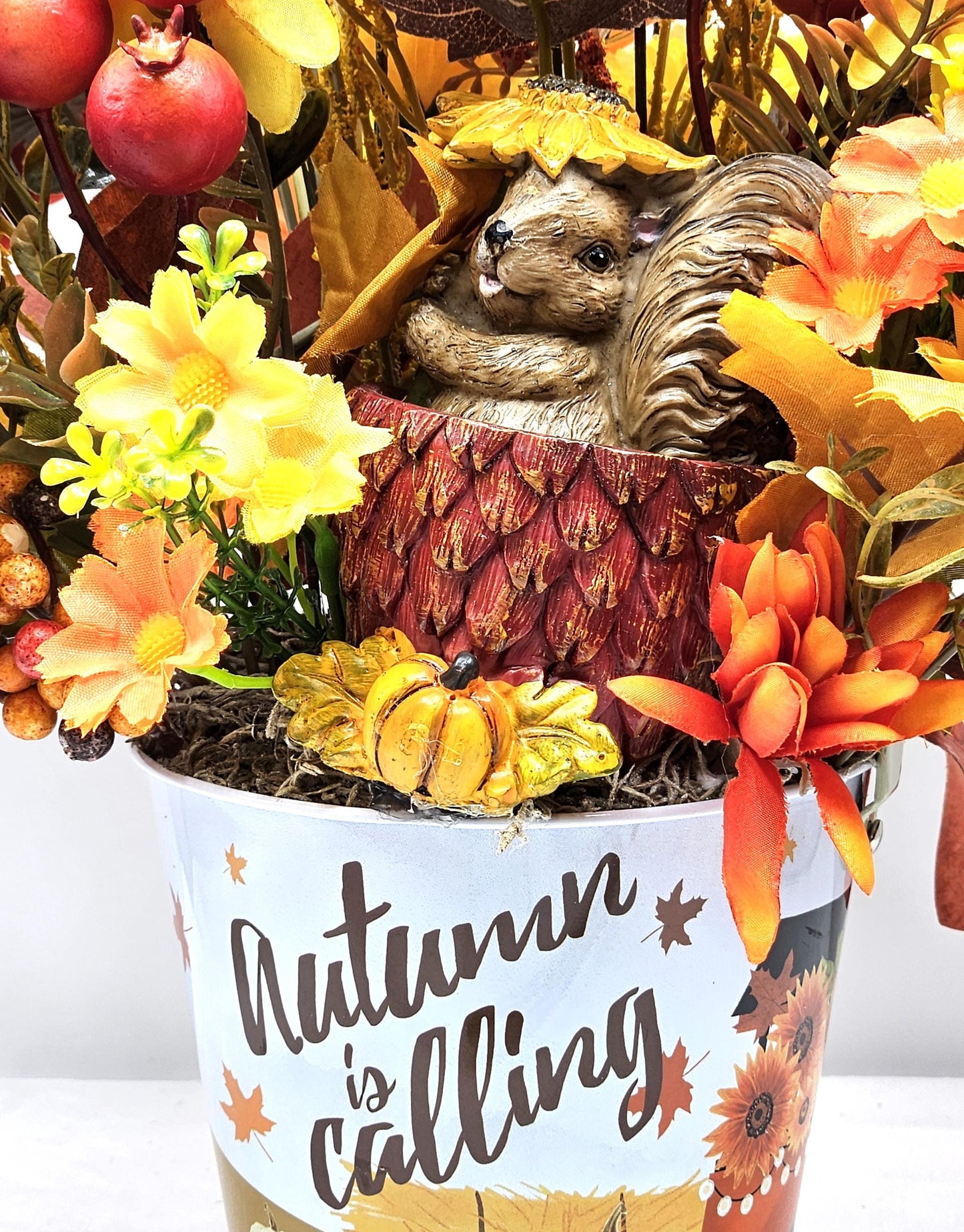Autumn Is Calling Flower Arrangement/Cute Ceramic Squirrel Amidst Burnt Orange/Yellow Fall Flowers/Pine Cones/Berries/Wheat/Fall Grasses