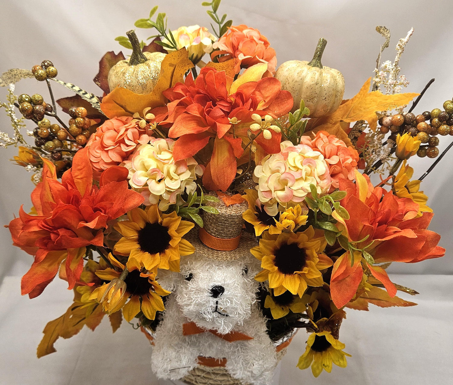 Fall Flower Arrangement with White Dog in Woven Basket: Autumn Decor