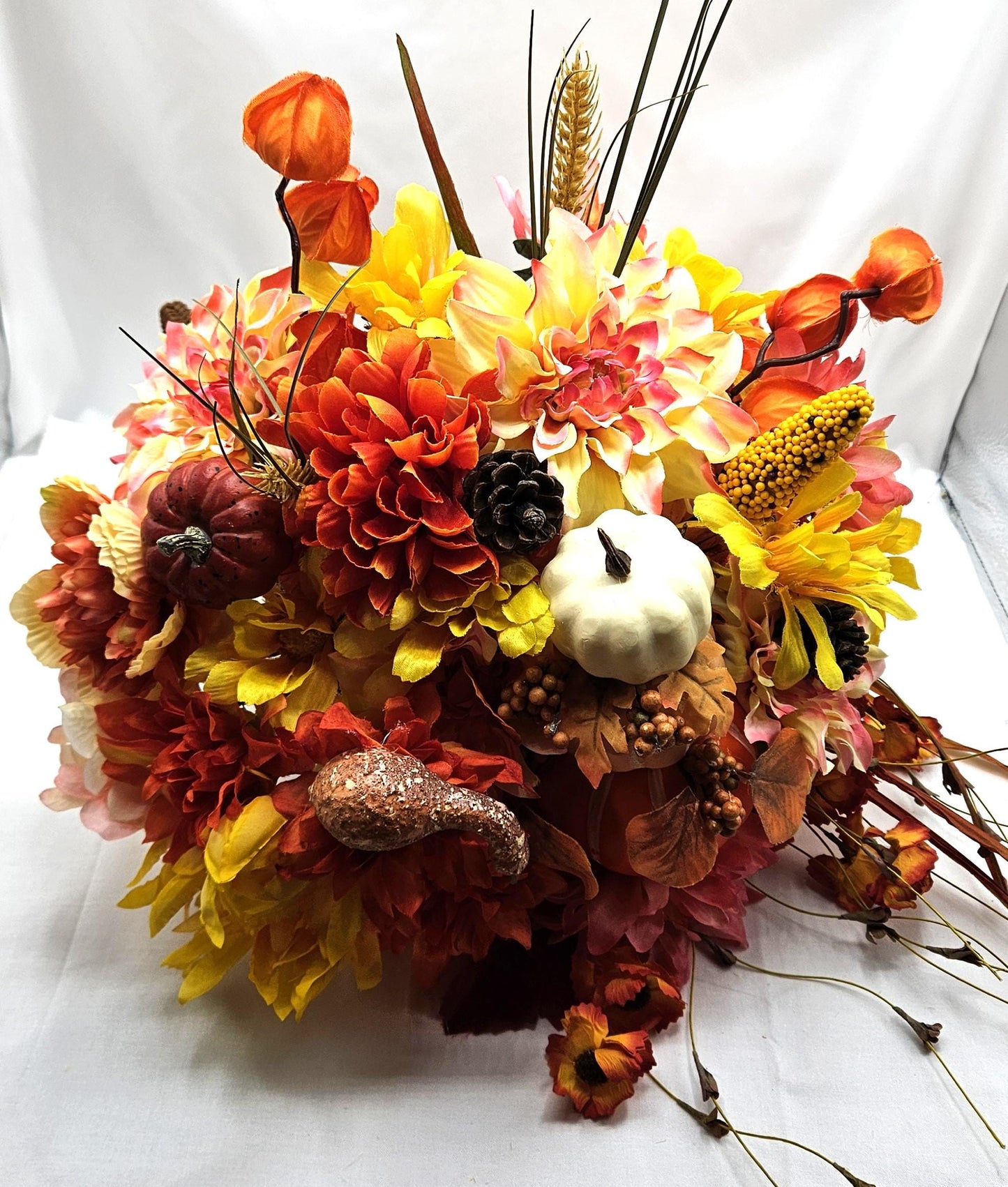 Elegant Thanksgiving Cornucopia with Orange and Yellow flowers, leaves, grasses, gourd and other Accents as Holiday Decor or Give as a Gift