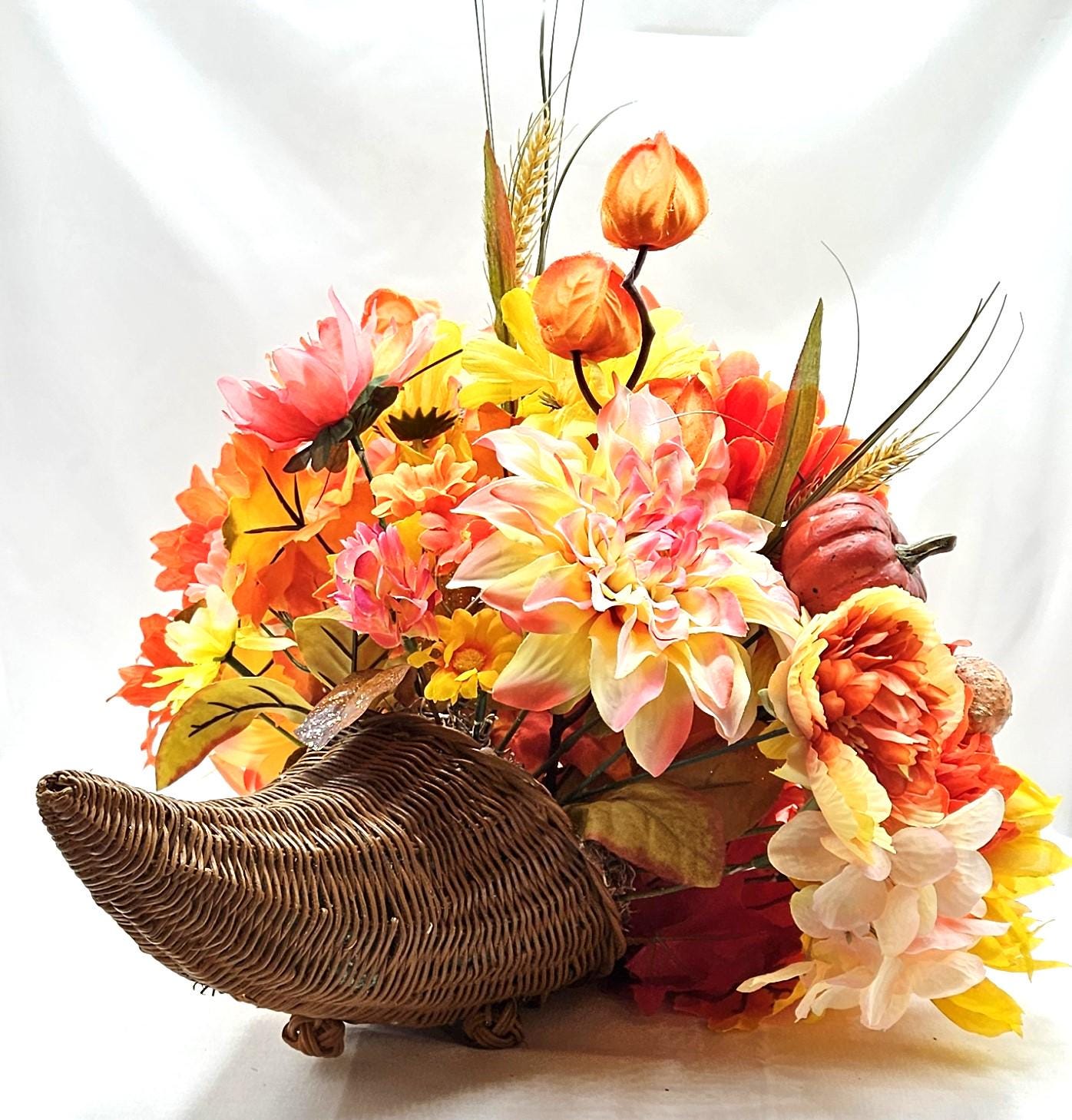 Elegant Thanksgiving Cornucopia with Orange and Yellow flowers, leaves, grasses, gourd and other Accents as Holiday Decor or Give as a Gift