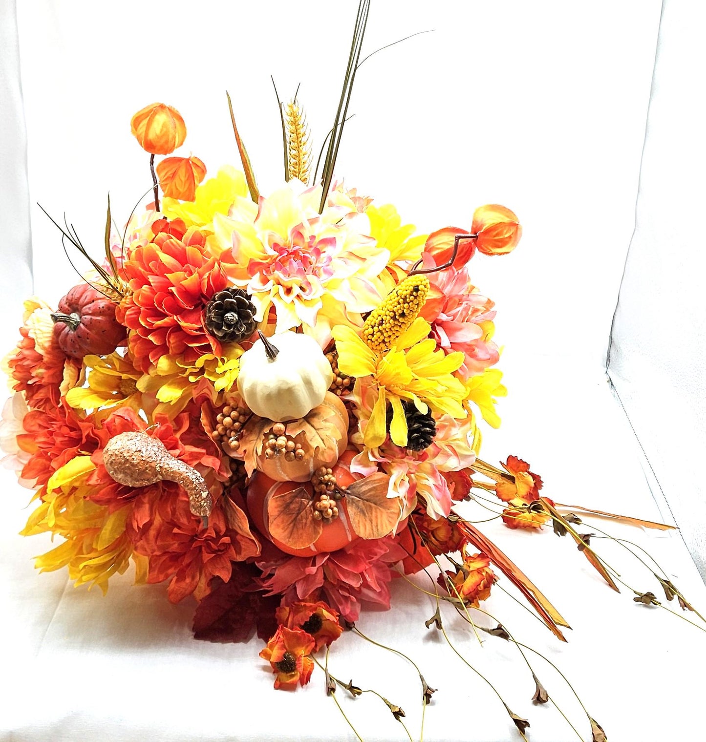 Elegant Thanksgiving Cornucopia with Orange and Yellow flowers, leaves, grasses, gourd and other Accents as Holiday Decor or Give as a Gift