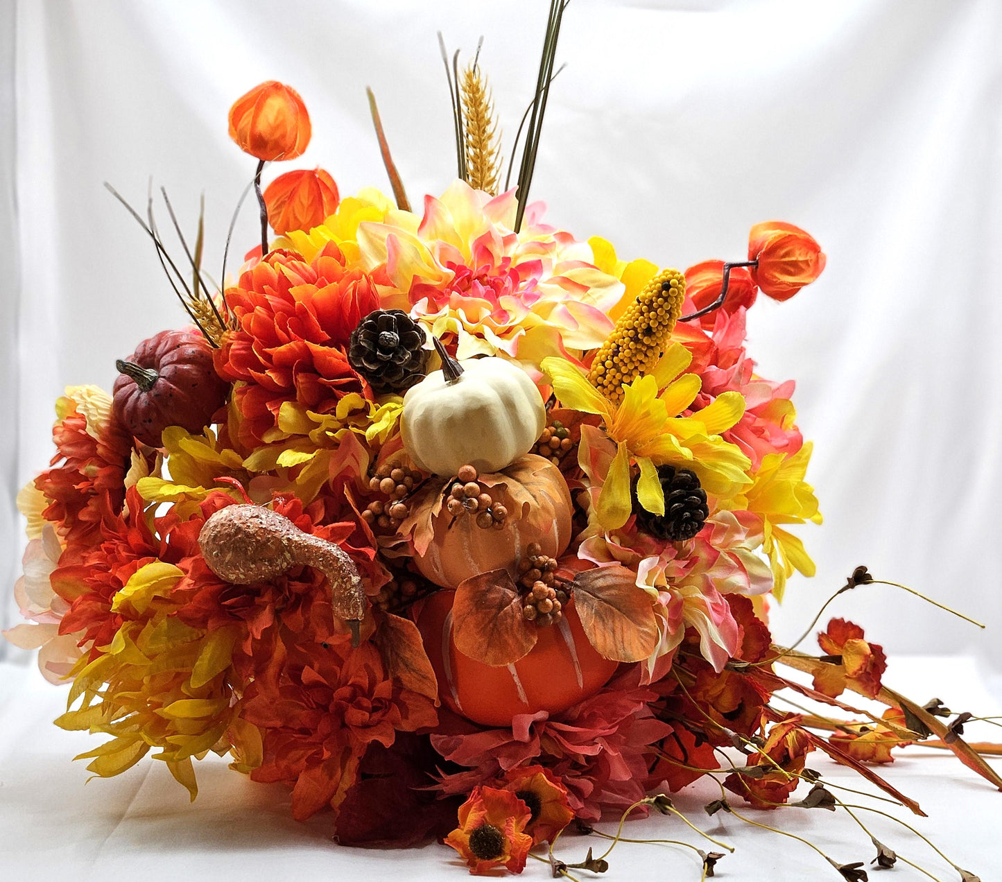 Elegant Thanksgiving Cornucopia with Orange and Yellow flowers, leaves, grasses, gourd and other Accents as Holiday Decor or Give as a Gift