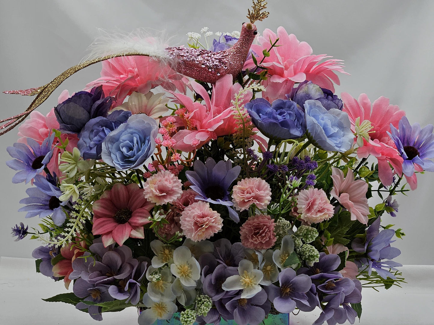 Pastel Pearlized Gift Box Filled with Vibrant/Lush Purple/Pink/White Flowers/Greenery/Baby's Breath/Sparkly Elegant Bird Atop the Florals