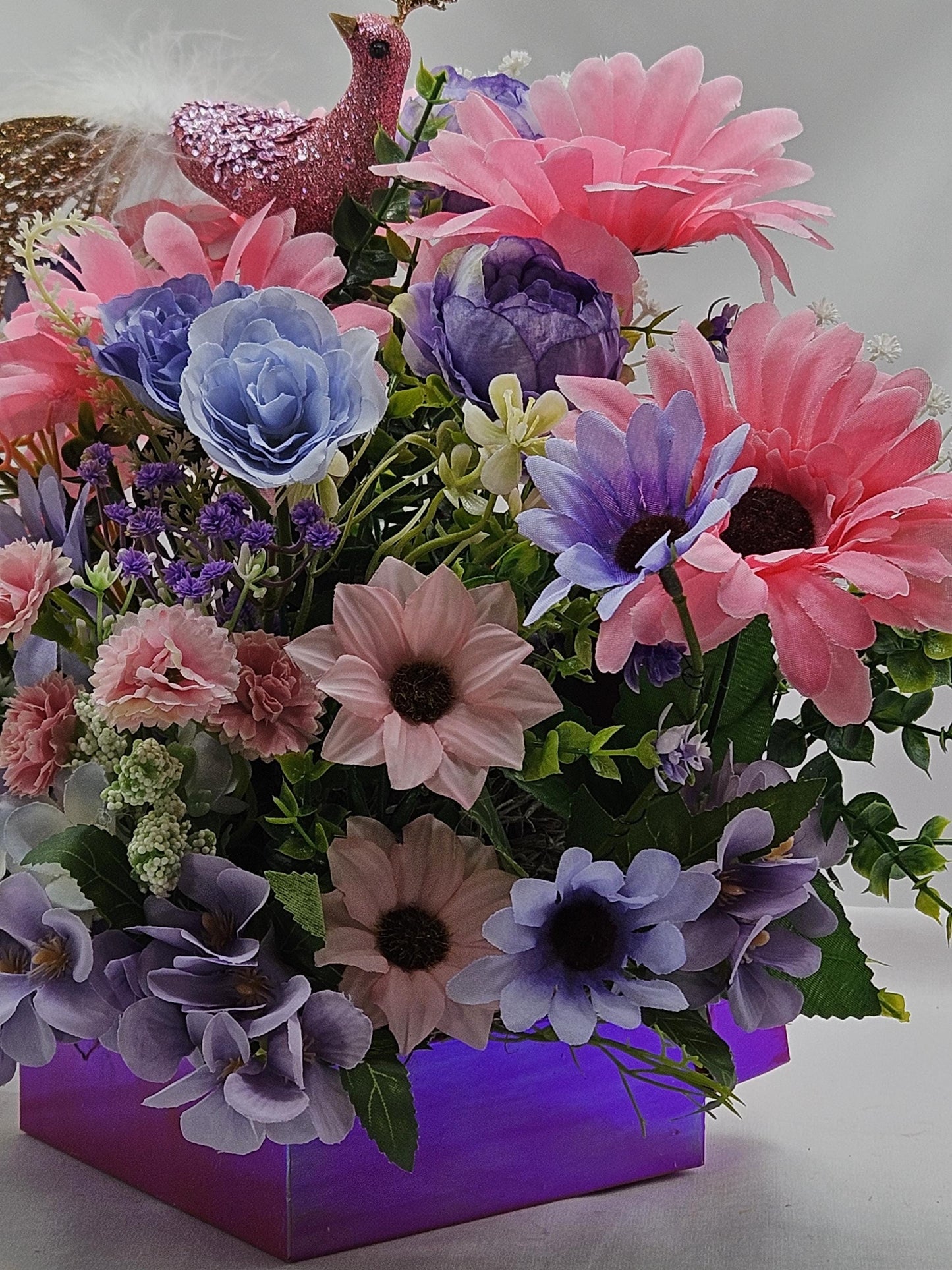 Pastel Pearlized Gift Box Filled with Vibrant/Lush Purple/Pink/White Flowers/Greenery/Baby's Breath/Sparkly Elegant Bird Atop the Florals