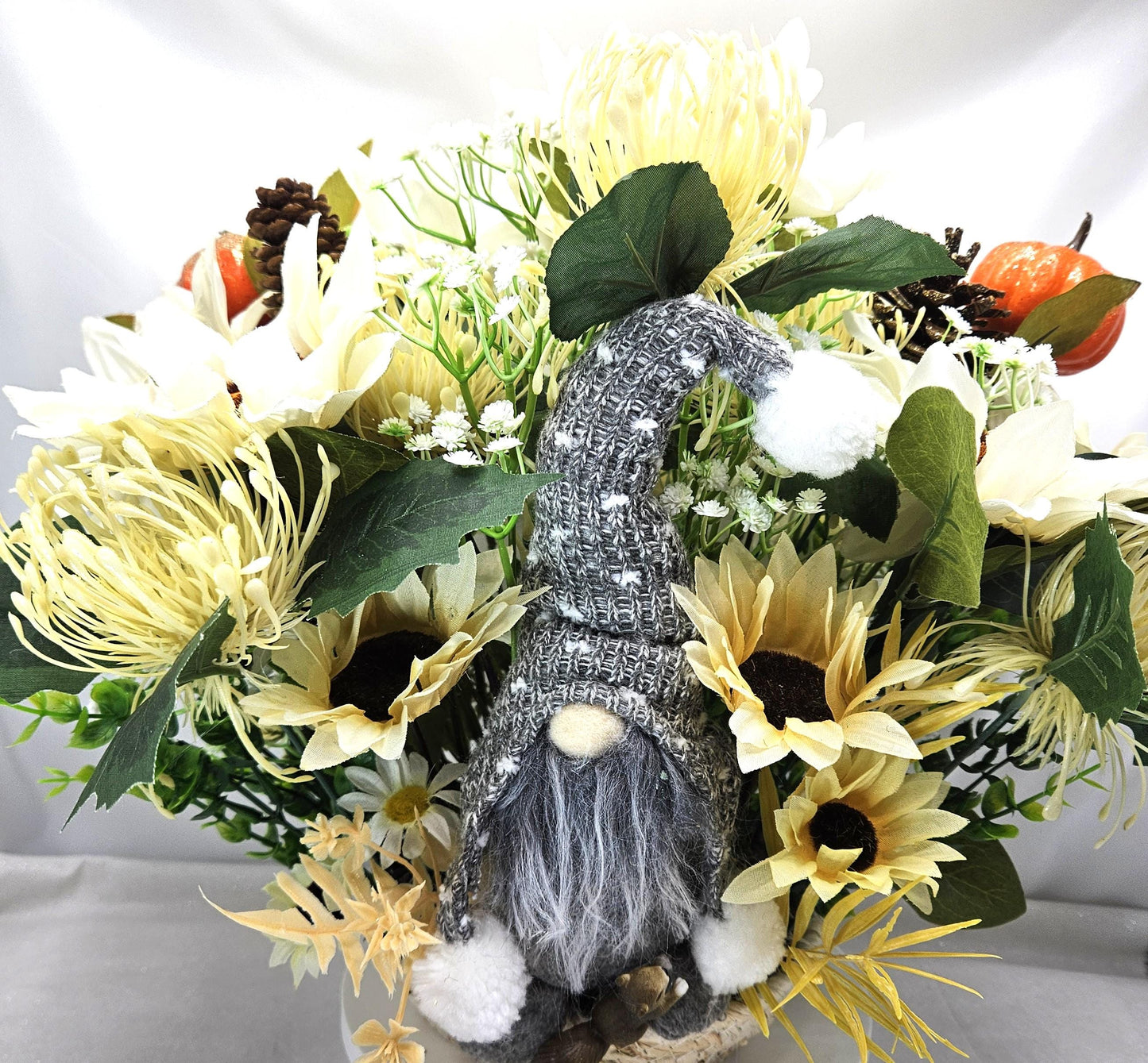 Cheerful Gray Gnome Sitting in Fall Garden of White Spider Mums/Sunflowers/Daisies/Pumpkinsa/Fall Leaves/Other Fall Accents/Woven Basket