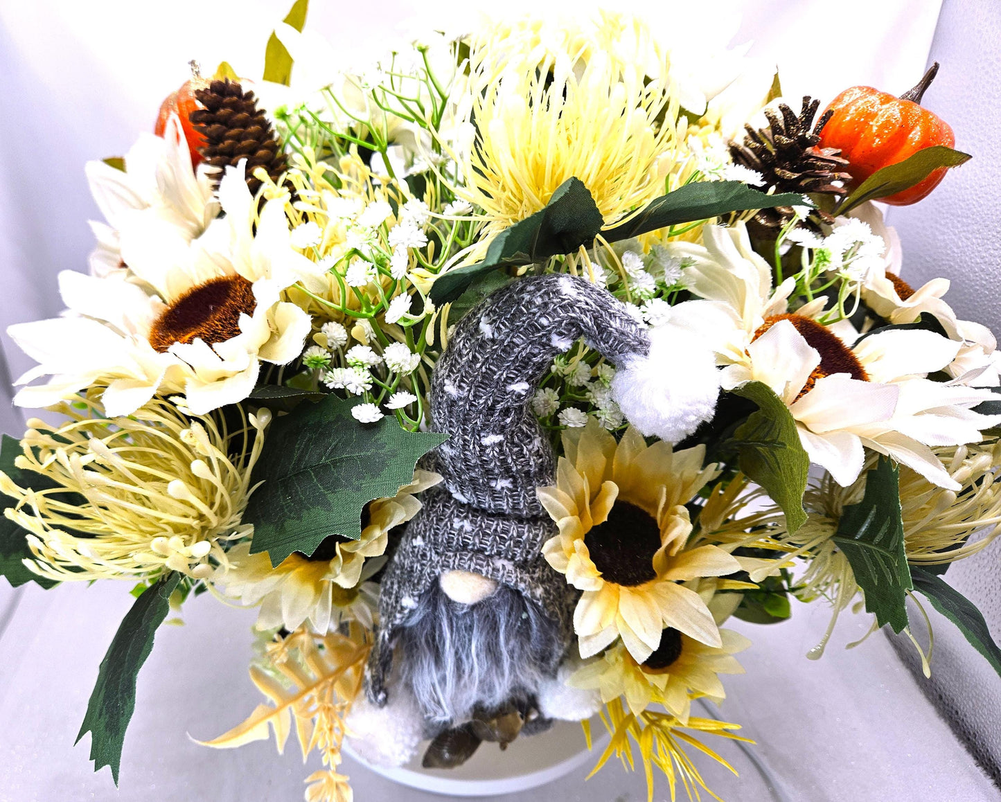 Cheerful Gray Gnome Sitting in Fall Garden of White Spider Mums/Sunflowers/Daisies/Pumpkinsa/Fall Leaves/Other Fall Accents/Woven Basket