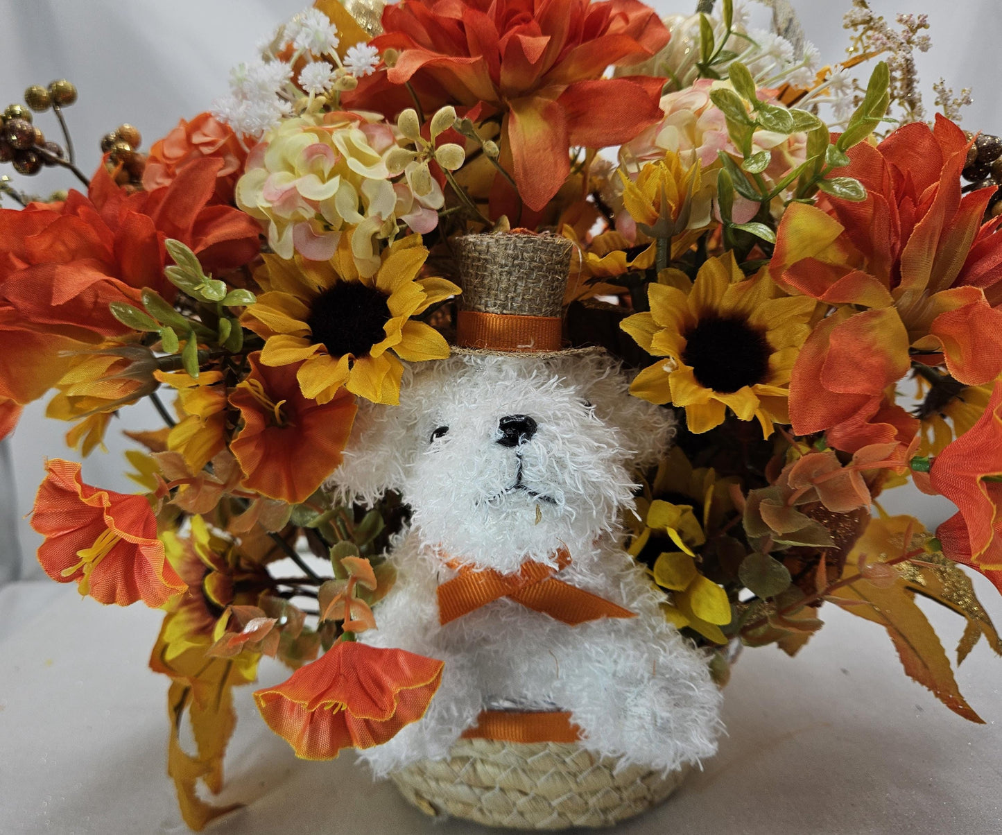 Fall Flower Arrangement with White Dog in Woven Basket: Autumn Decor
