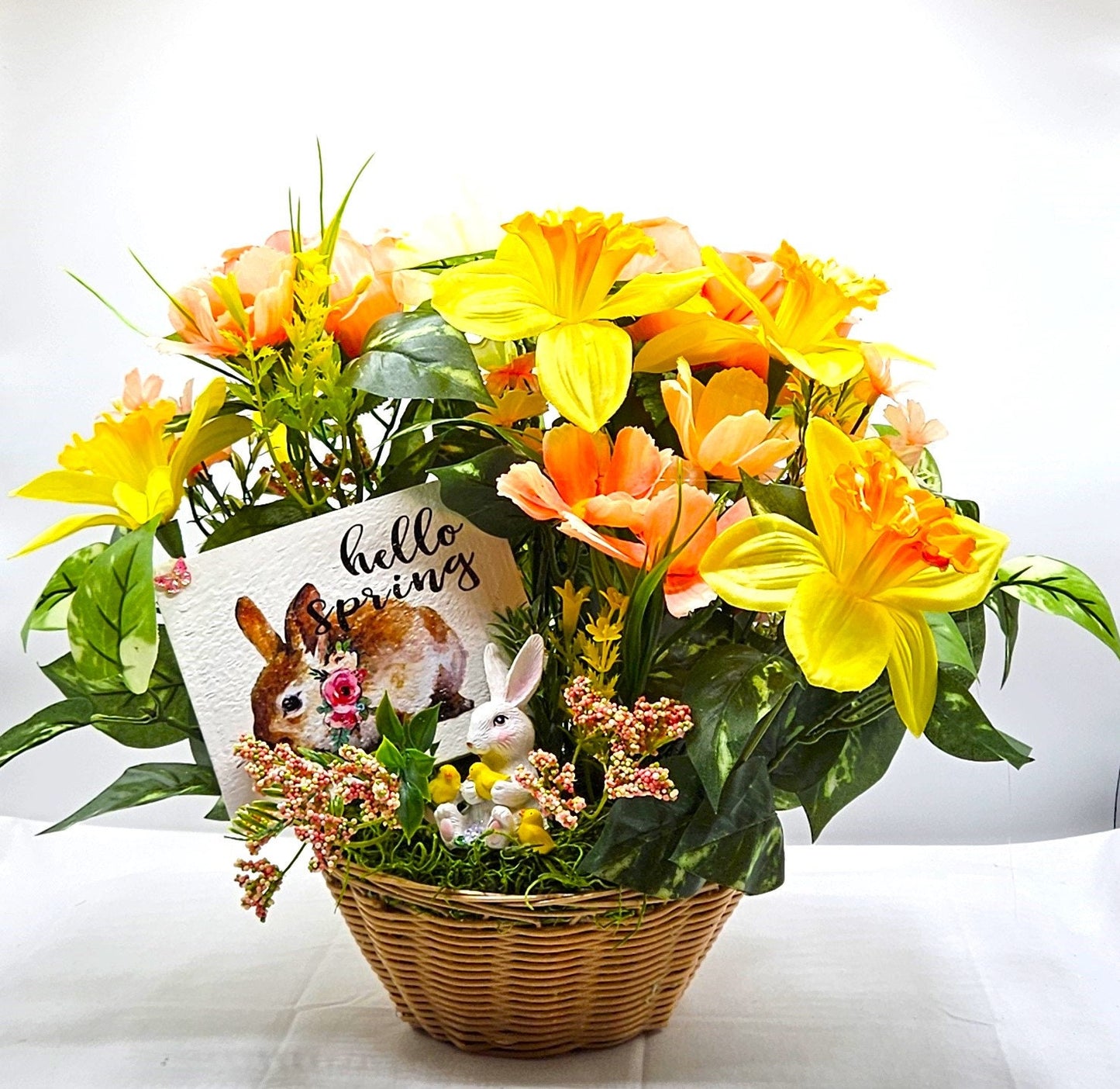 Hello Spring Flower Arrangement Featuring Cute Bunnies Amidst Daffodils, Cosmos, Peonies and Other Spring Flowers and Greenery