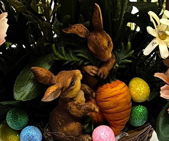 Charming Spring/Summer Flower Arrangement in Wicker Basket with Ceramic Bunnies with Carrot, Glitter, Pastel Flowers