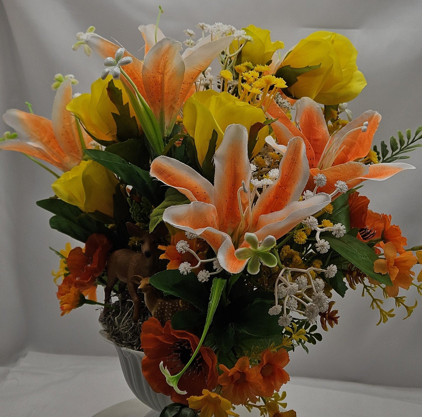 Momma and baby deer frolicking in a floral garden of yellow and orange Lilies, Pansies, Roses/other Florals, Greenery/Baby's Breath/Gifting