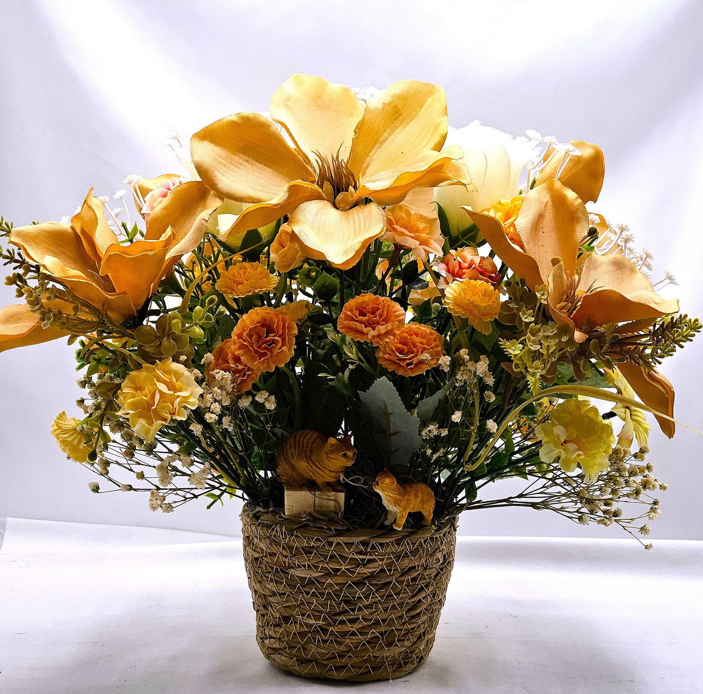 A Purr-fectly Stunning Floral Arrangement w/2 Tabby Tan Cats at the Front of Tan Magnolias/White Roses/Other Florals/Baby's Breath