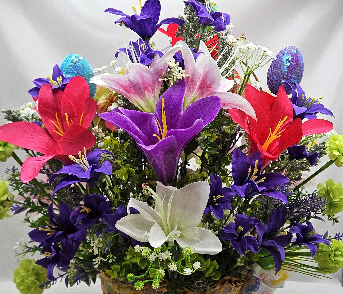 Exquisite Multi-Colored Scalloped Easter Basket w/Lovely Glittery Bow/A Variety of Lilies in Basket/Rabbit Pushing Cart/Other Easter Accents