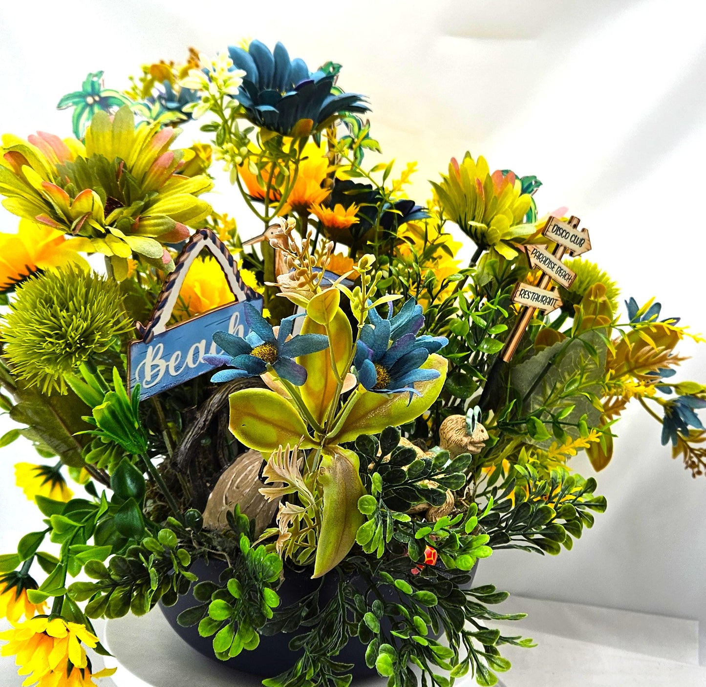 Fun in the Sun Turtle Mania Tropical Flower Arrangement/Turtle in Sunglasses in garden of Teal/Yellow/Green Flowers/Greenery/Bridge