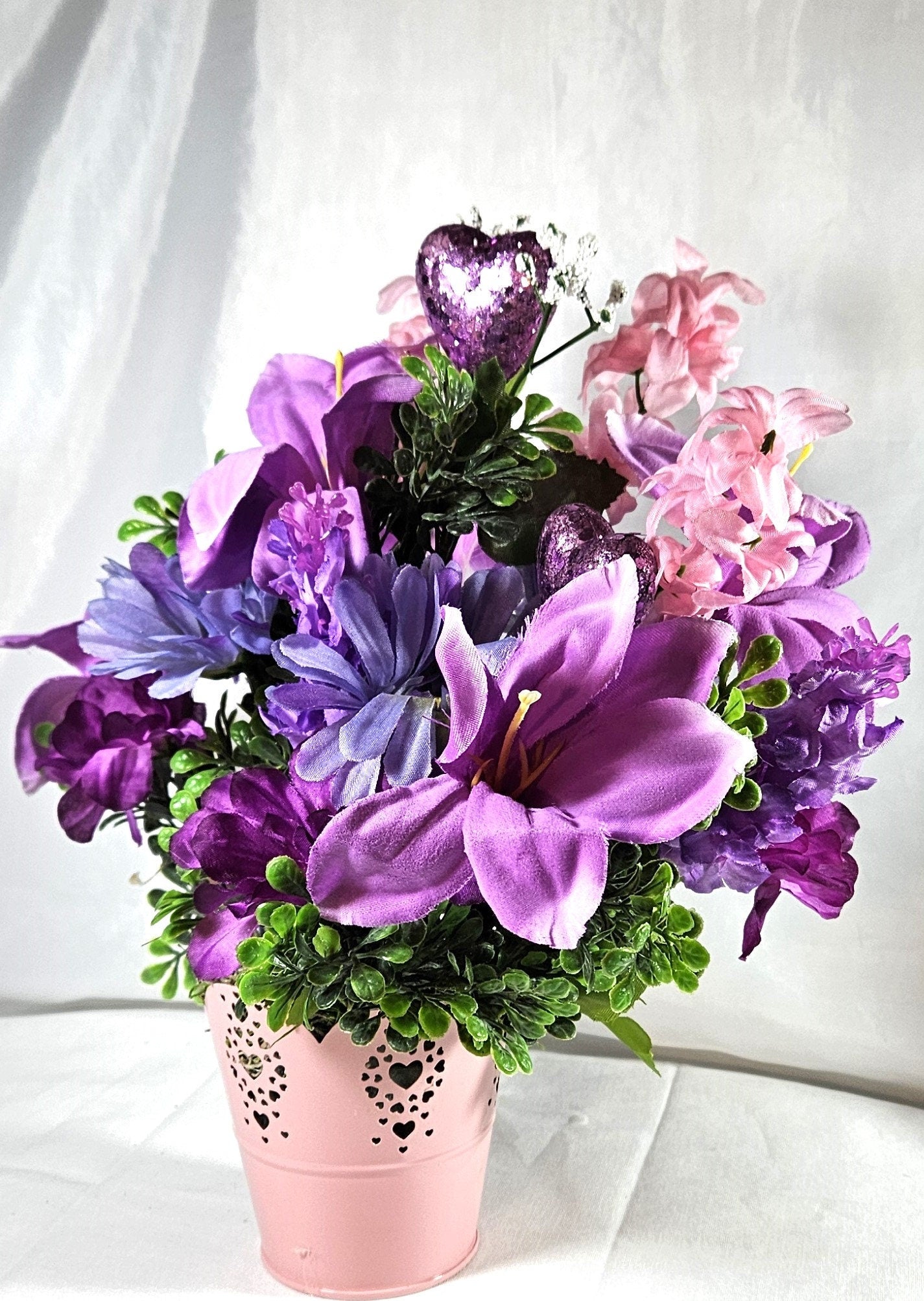 Heartwarming Flower Arrangement with a Kissing Couple Among Blue, Lilac, and Pink Florals Plus Sparkly Hearts