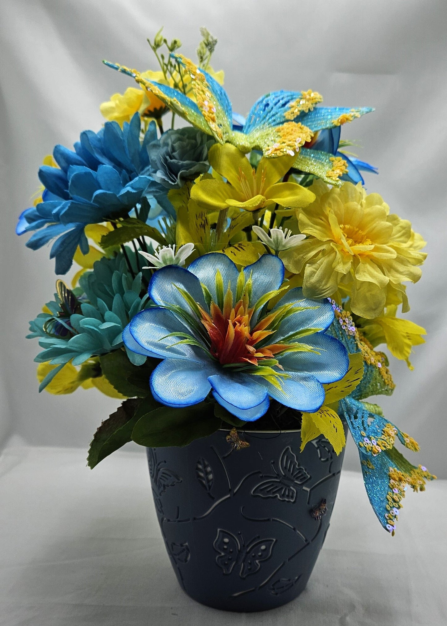 Butterfly Flower Arrangement, Sparkling Butterflies and Florals in Decorated Butterfly Pot, Yellow/Teal Blue Flowers & Butterfly Accents