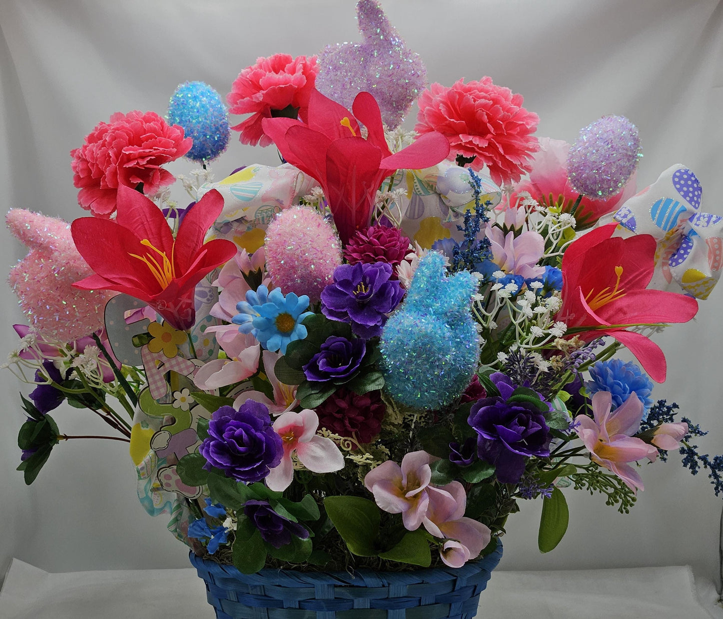 Elegant Lovely Easter Basket Adorned w/Glitter Bunnies, Eggs, Pretty Ribbon/Multi-Colored Lilies/Daisie/Other Spring Flowers/Easter Sign