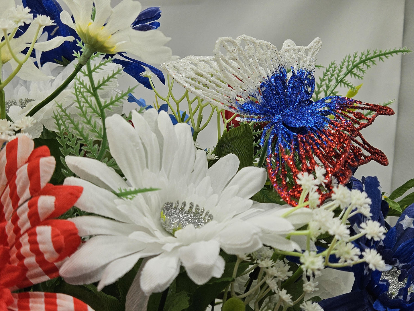 Gnome in the USA Patriotic Flower Arrangement, Oval Wicker Basket, Red White Blue Daisies, Sunflowers, Carnations