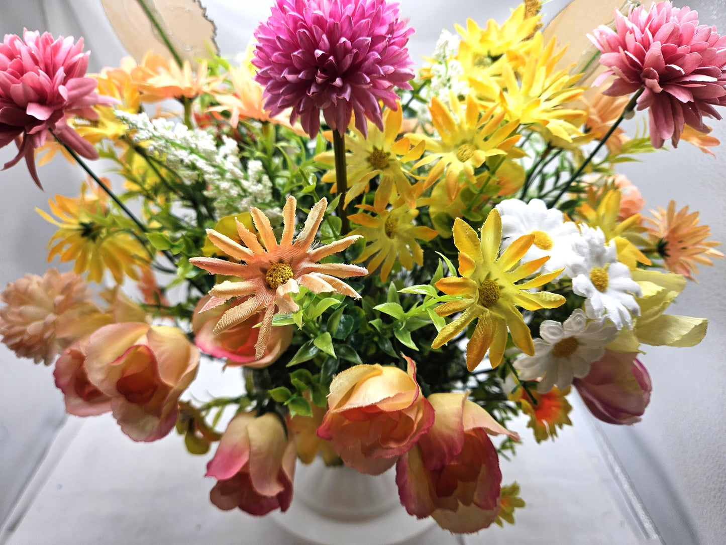 Cheery Hello Spring Floral with Cute Rabbits, Pansies, Daisies, Tulips and Other Vibrant Wildflowers in an Elegant Plastic Footed Bowl