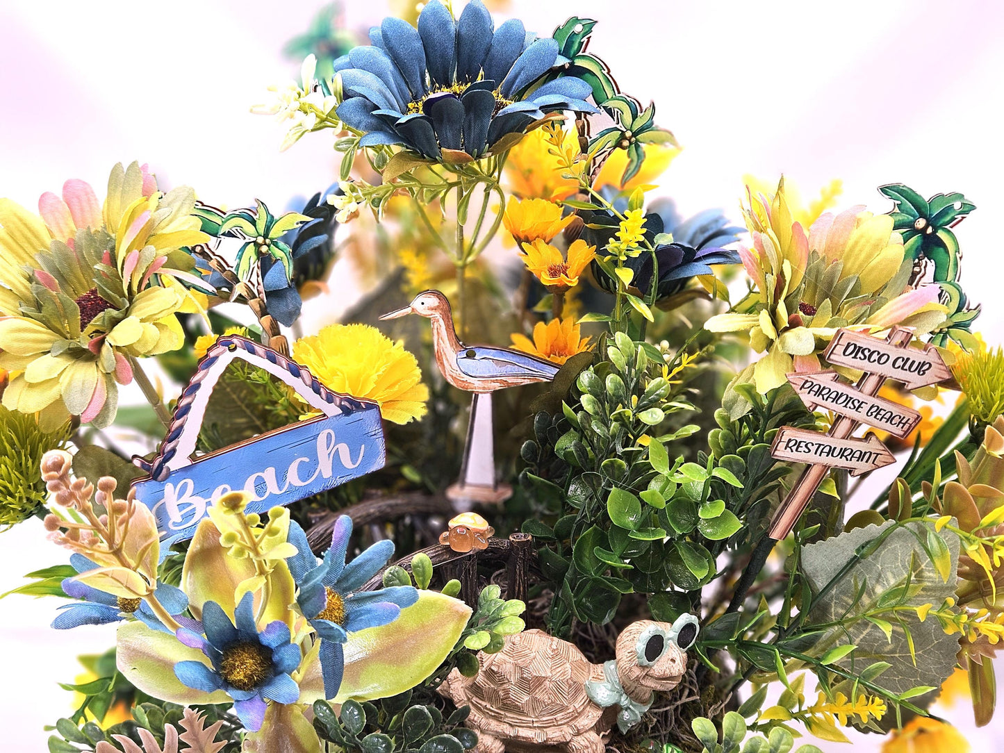 Fun in the Sun Turtle Mania Tropical Flower Arrangement/Turtle in Sunglasses in garden of Teal/Yellow/Green Flowers/Greenery/Bridge