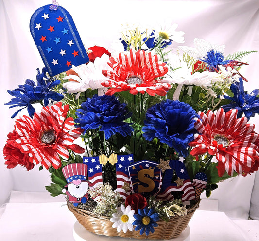 Gnome in the USA Patriotic Flower Arrangement, Oval Wicker Basket, Red White Blue Daisies, Sunflowers, Carnations